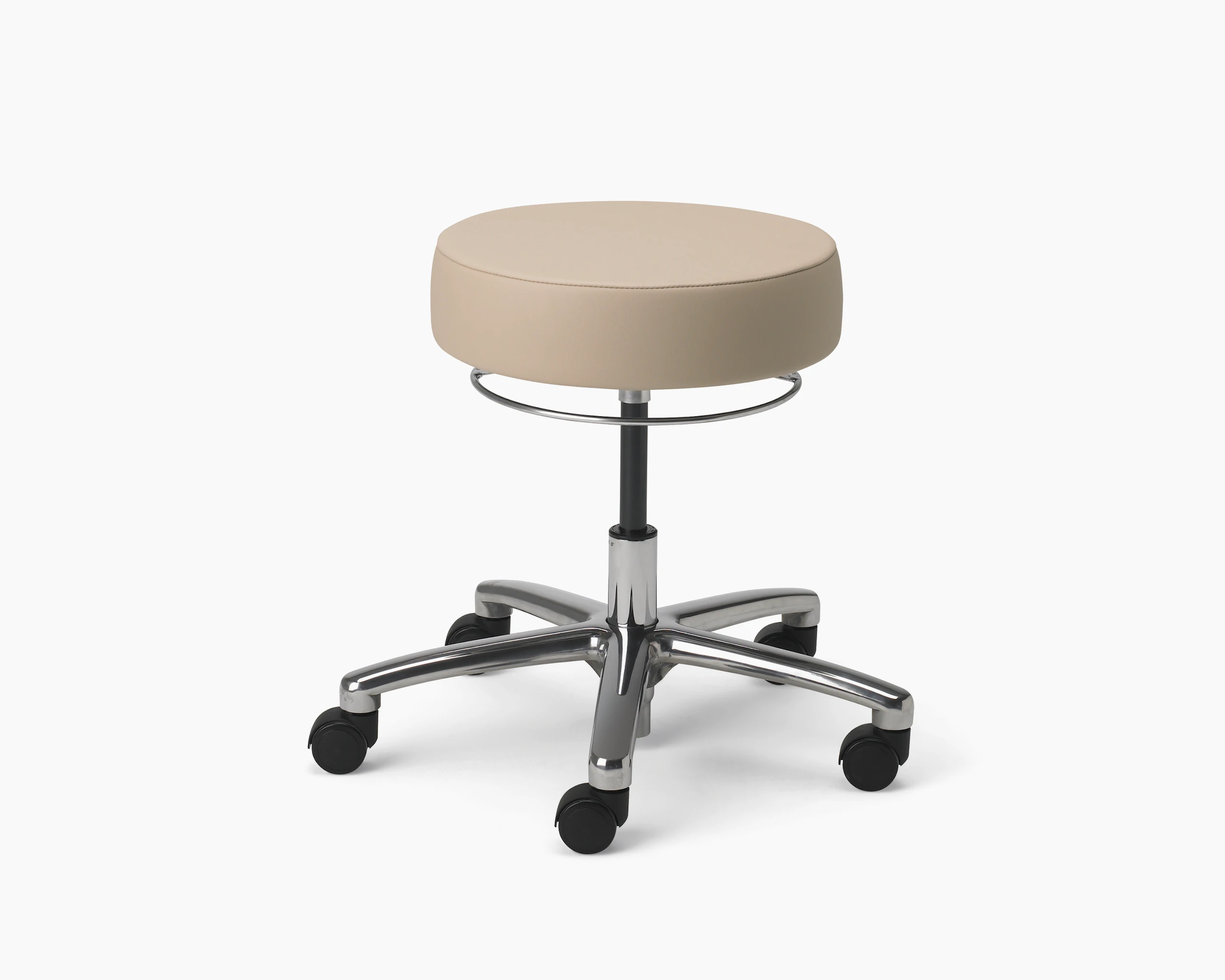 A FX9606 Physician Stool in tan fabric with aluminum base and polyurethane casters.