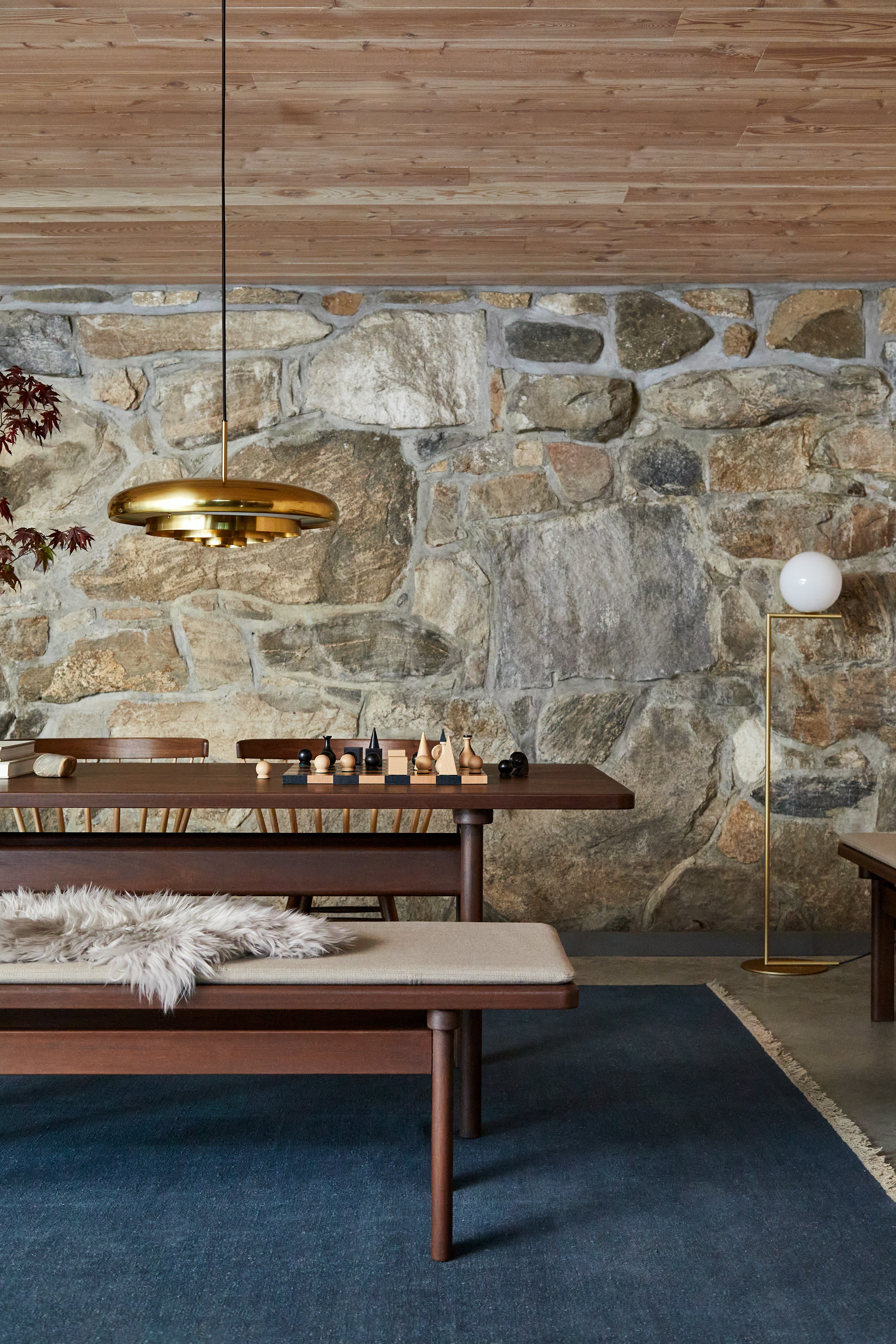 Resonant Pendant, Asserbo Table, Asserbo Bench and Nakashima Chairs in a dining room setting
