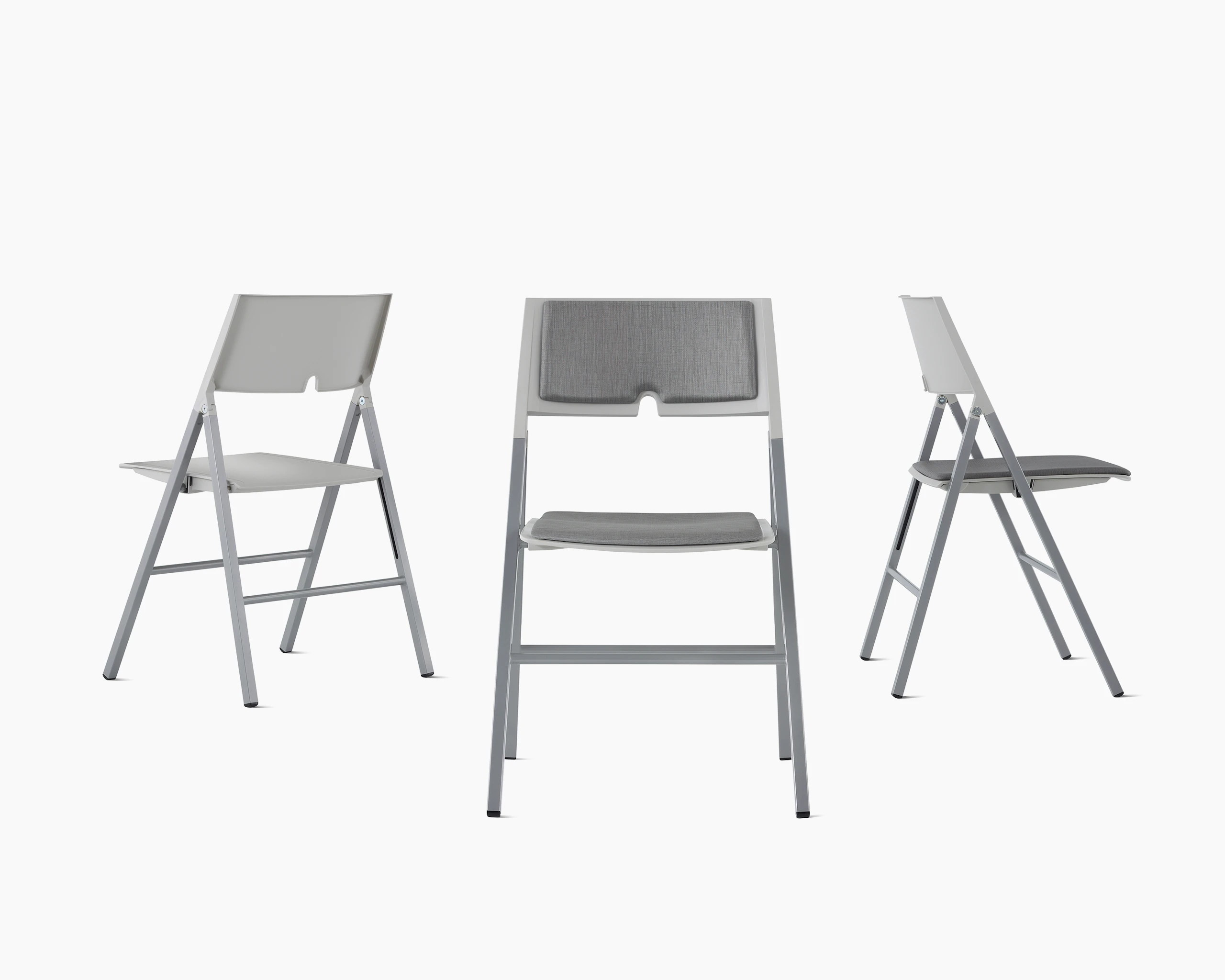 Three Axa Folding Chairs in various views and upholstery options.