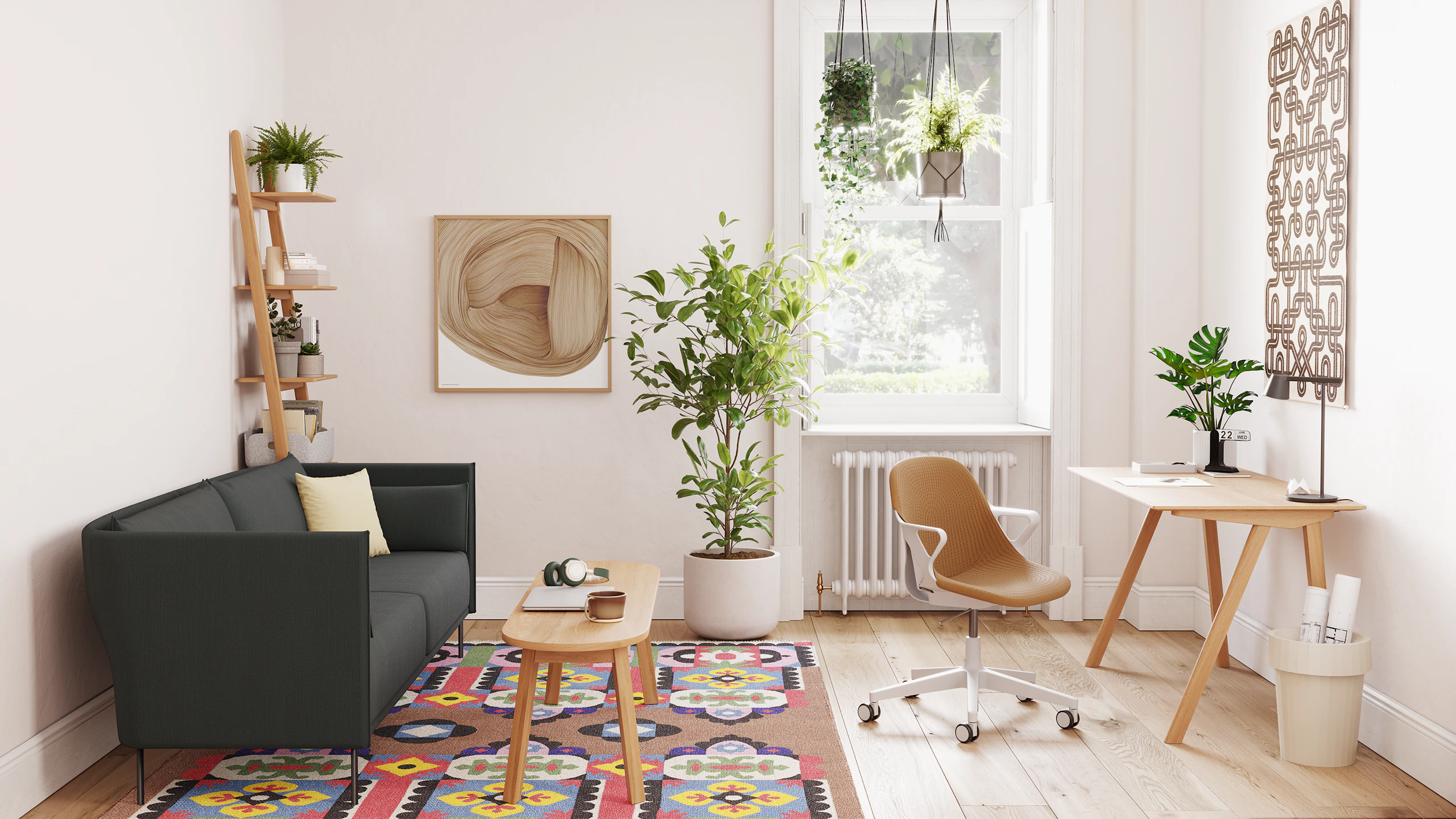 A light grey Zeph chair with a light brown knit cover is in front of a desk table in a small office with a grey sofa and coffee table.