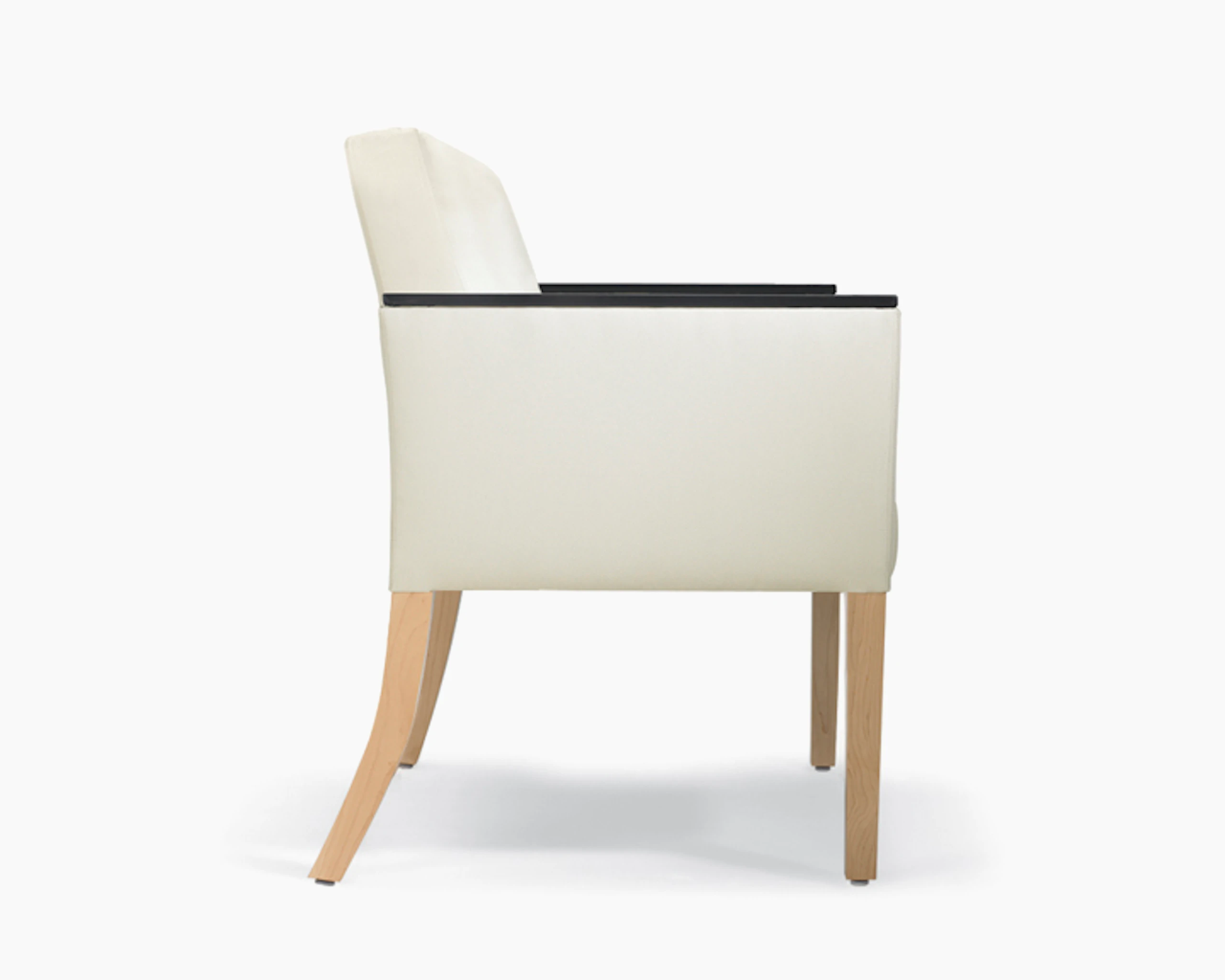 A side view of Brava 862 Plus Chair in white textile with urethane arm caps and maple legs.