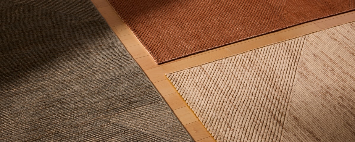 Closeup view of three Ema Handknotted Wool Rugs