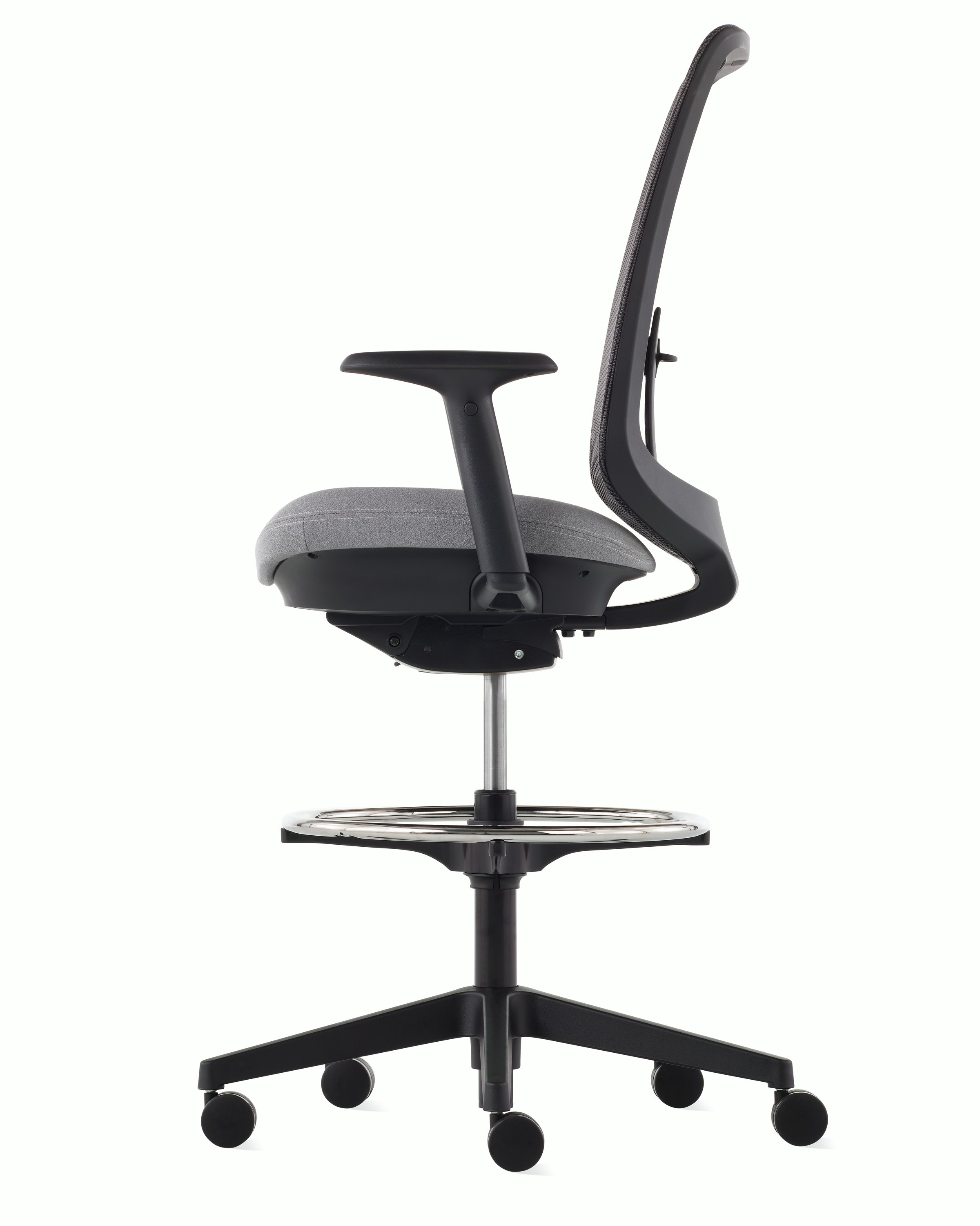 A black Verus Stool with a suspension back, grey seat and black frame viewed from the side.