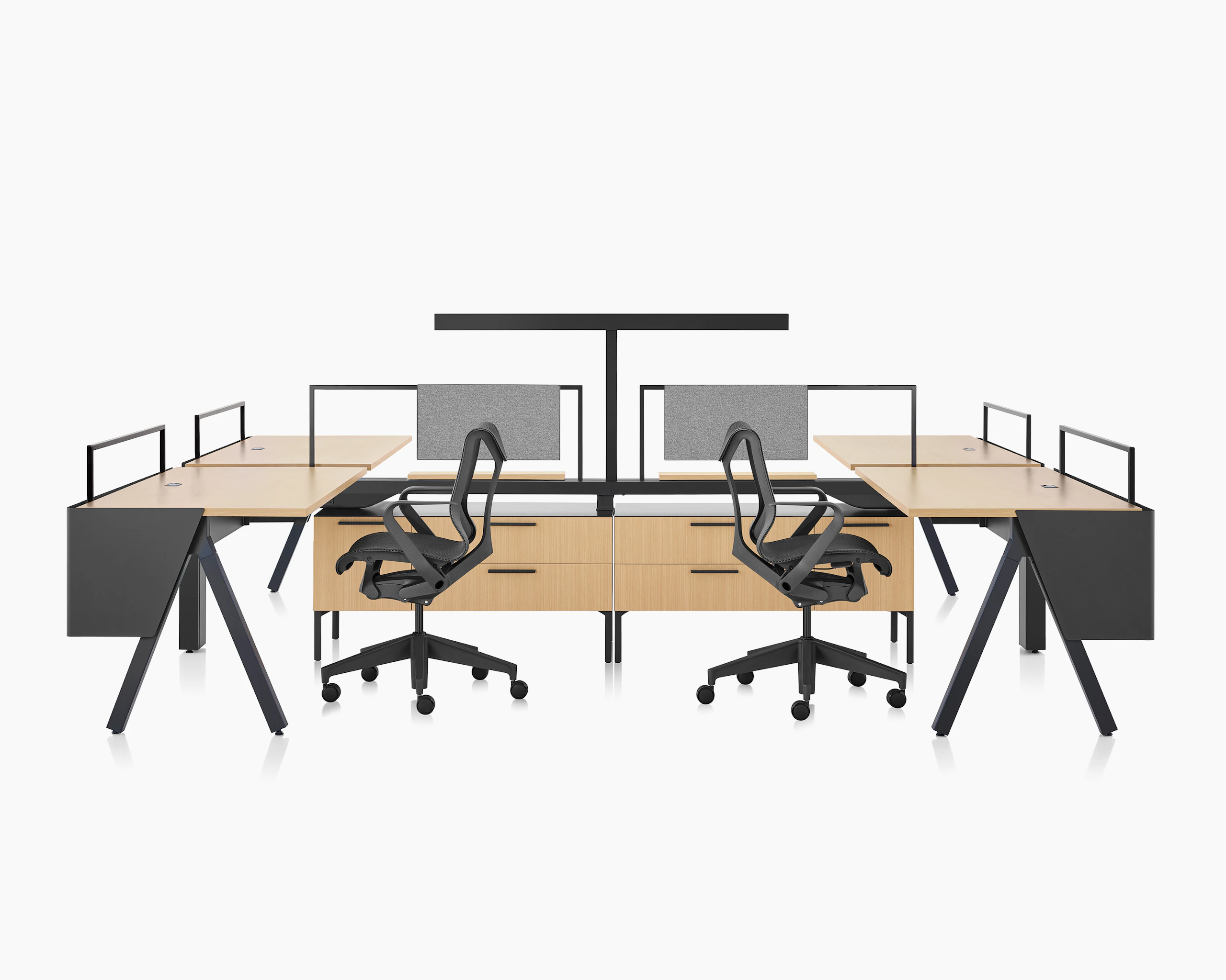 Brown and black Canvas Vista workstations with a-shaped legs, modesty screens, t-shaped light and black Cosm chairs.