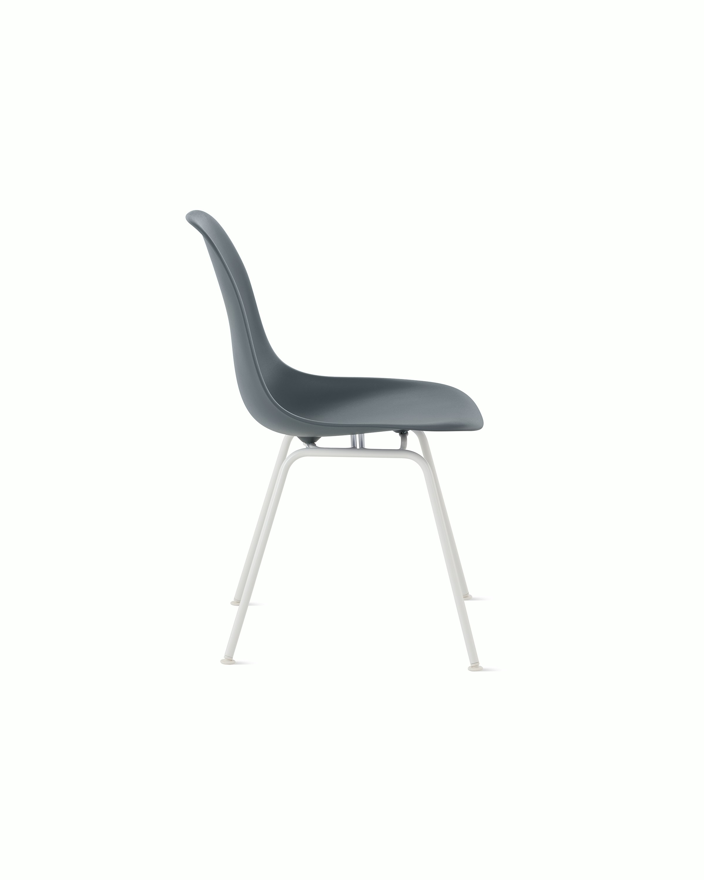 Side of  medium grey plastic shell chair on 4-leg base.