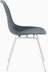 Side of  medium grey plastic shell chair on 4-leg base.