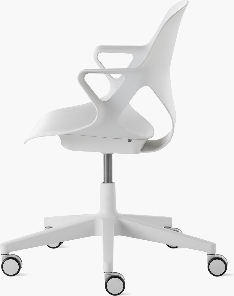 Side view of a Zeph chair with fixed arms in light grey.