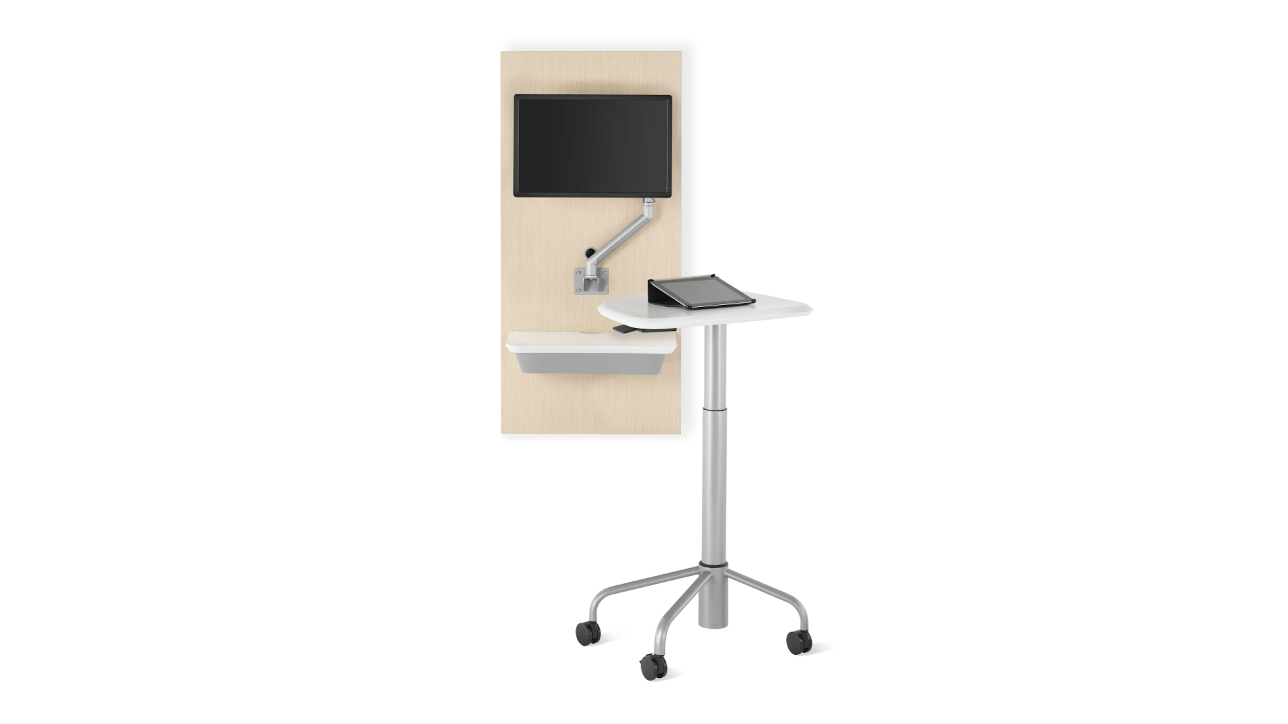 An Intent Solution technology support wall unit in an ash finish with a white surface and a silver monitor arm with monitor.