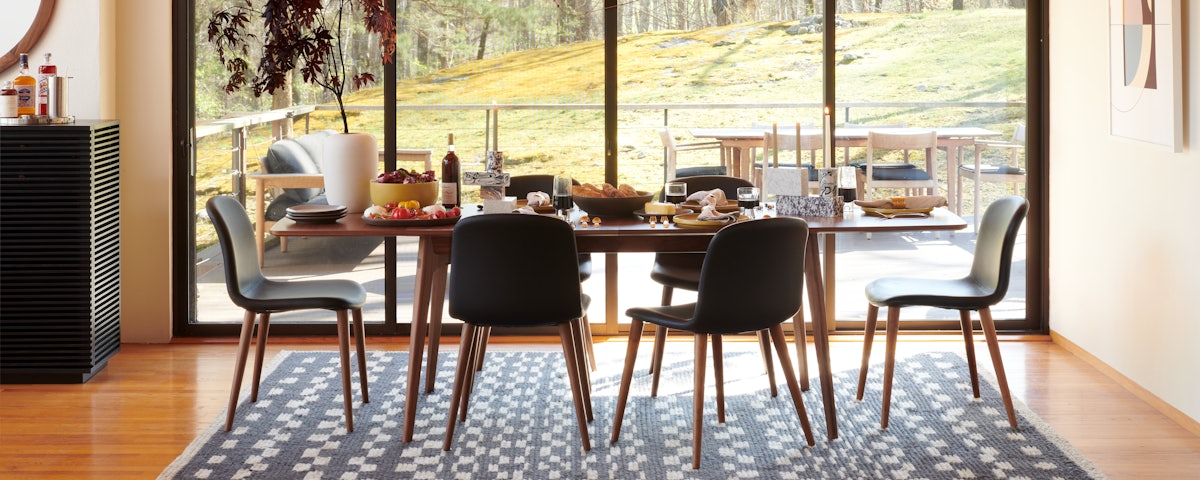 Dulwich Extension Table, Bacco Chairs, and Flock of Lights in a dining room setting