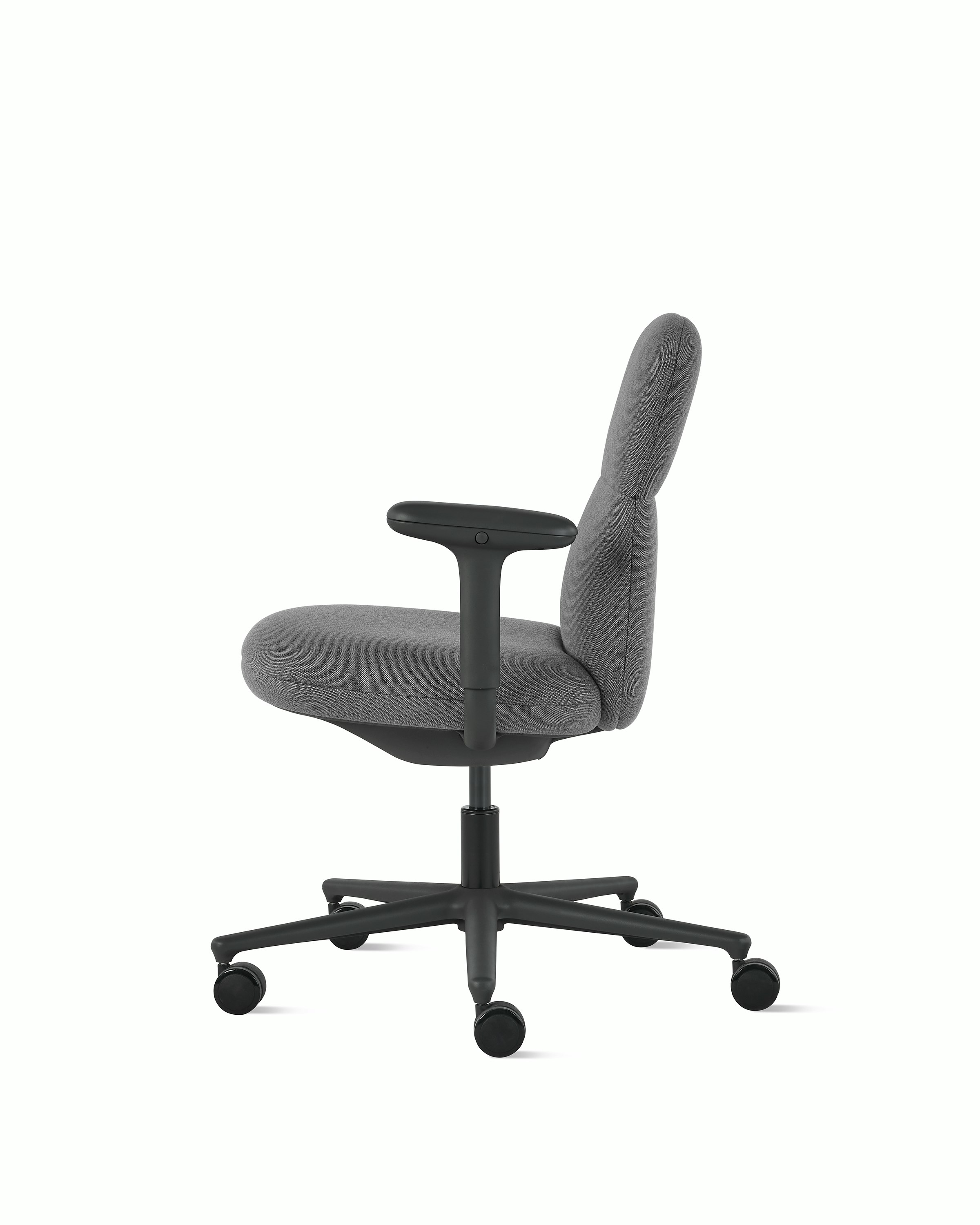 Side view of a mid-back Asari chair by Herman Miller in dark grey with height adjustable arms.