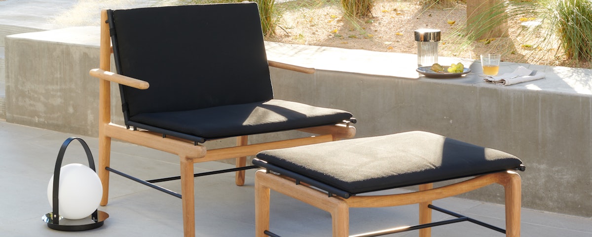 Finn Lounge Chair and Ottoman in an outdoor patio setting