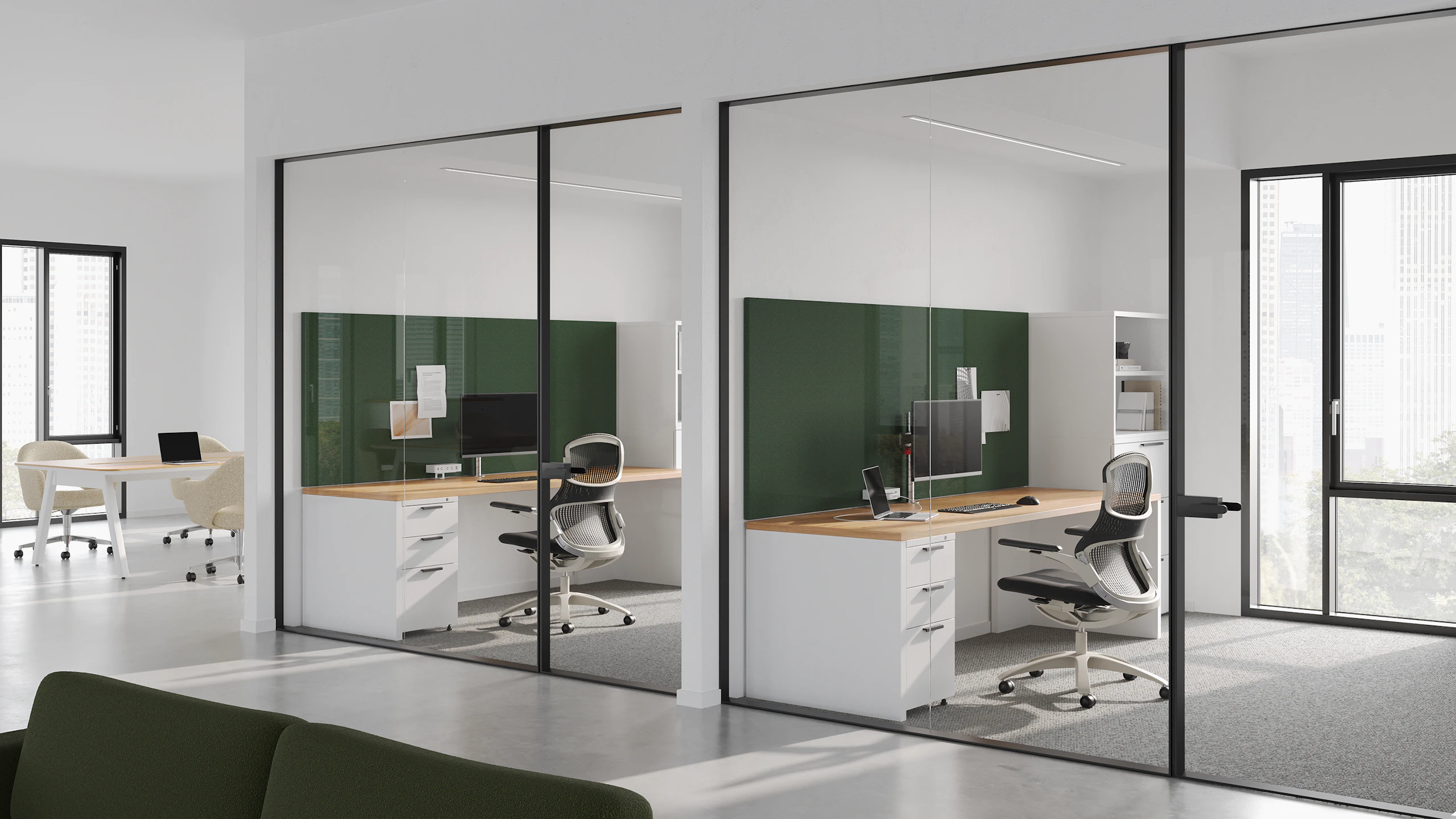 Private offices with white Series 2 storage pedestal with Dividends Skyline work surface and white and black Generation Task Chairs.