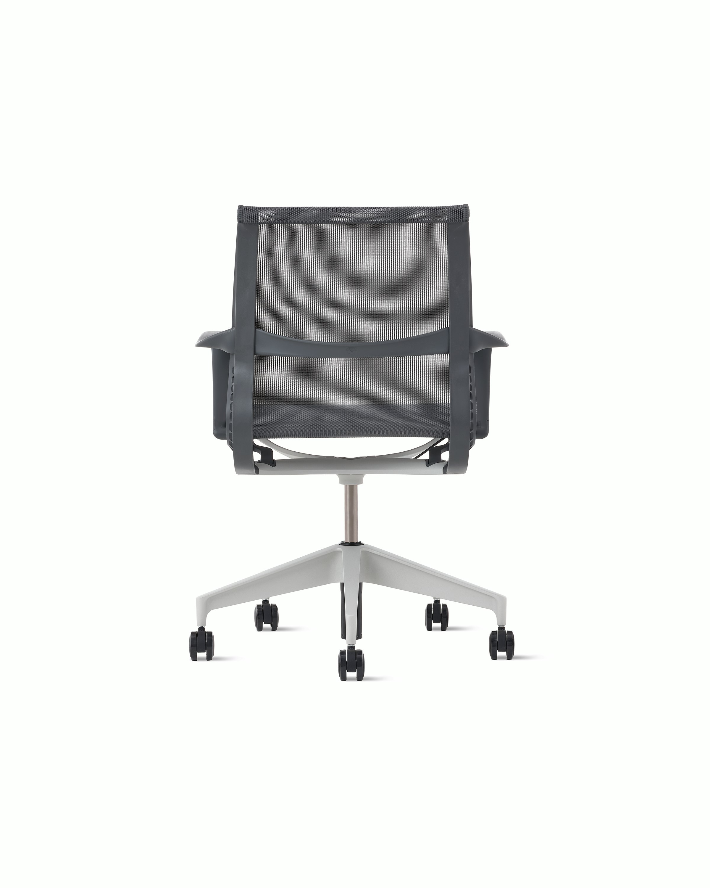 Rear view of a Setu chair in grey with a silver alloy base.