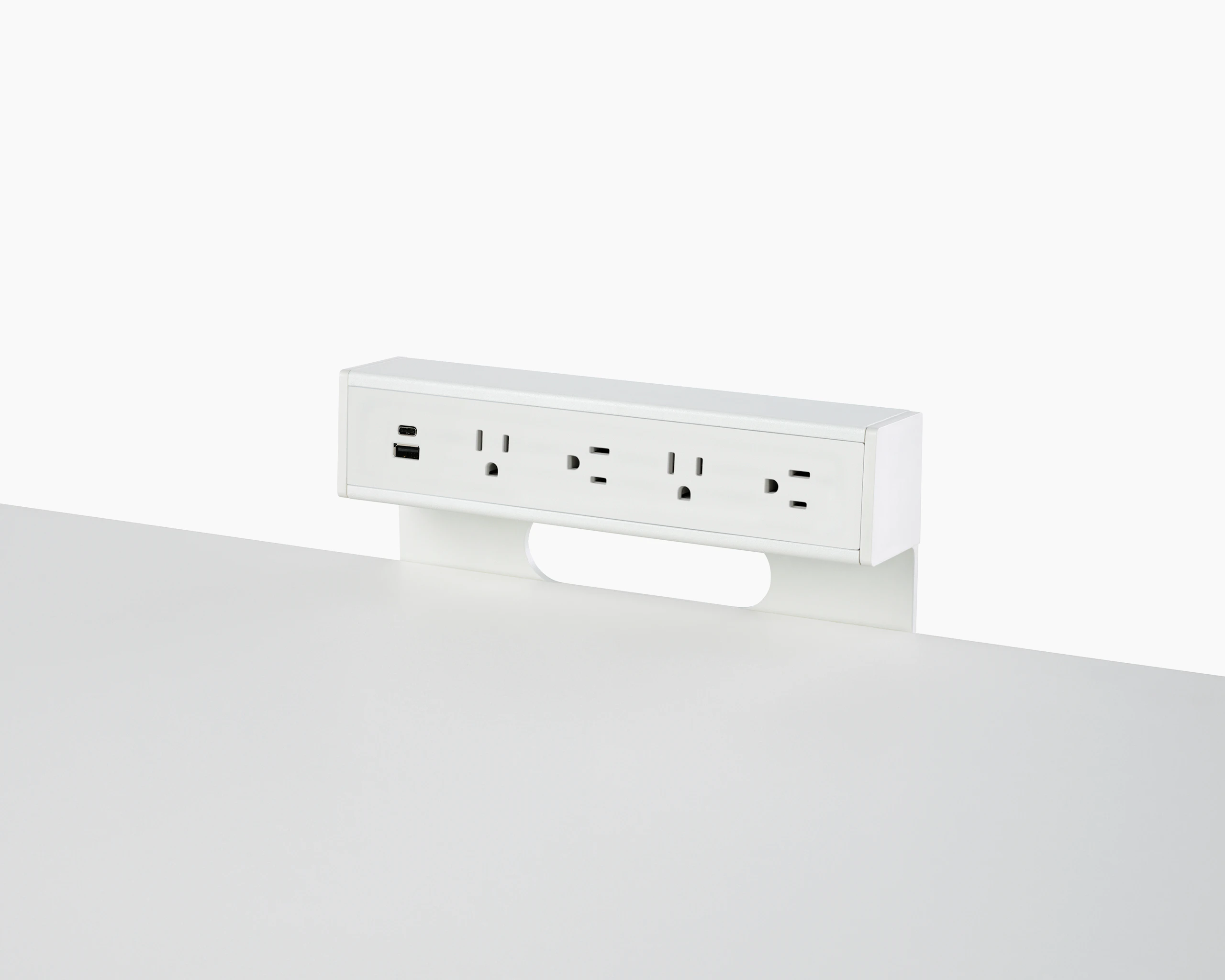 USB-A port, USB-C port, and four A/C power outlets on an attached table power source.