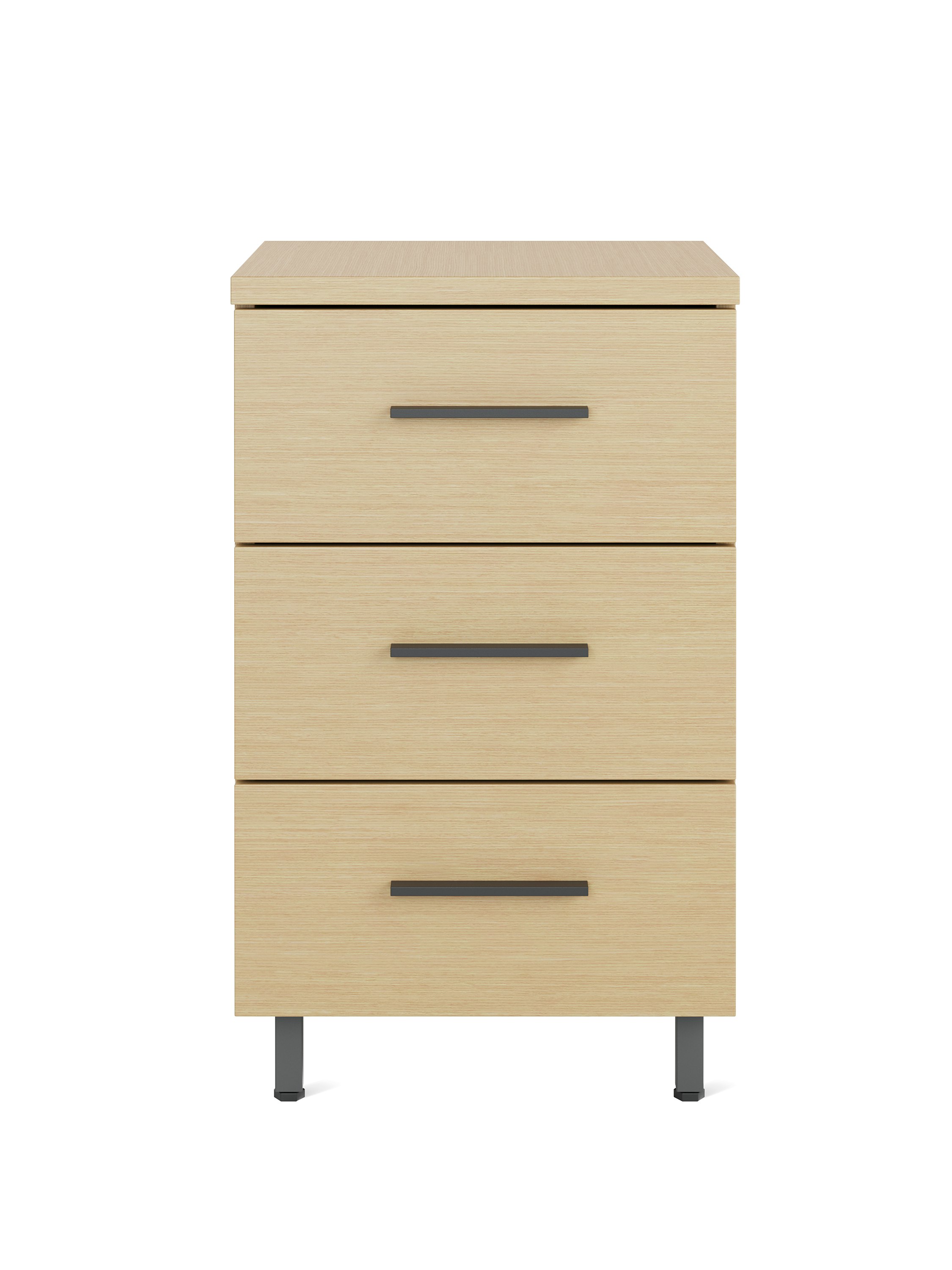Front view of a single Nemschoff Bedside Cabinet in a oak on ash finish with three drawers, graphite bar pulls, and metal raised legs.