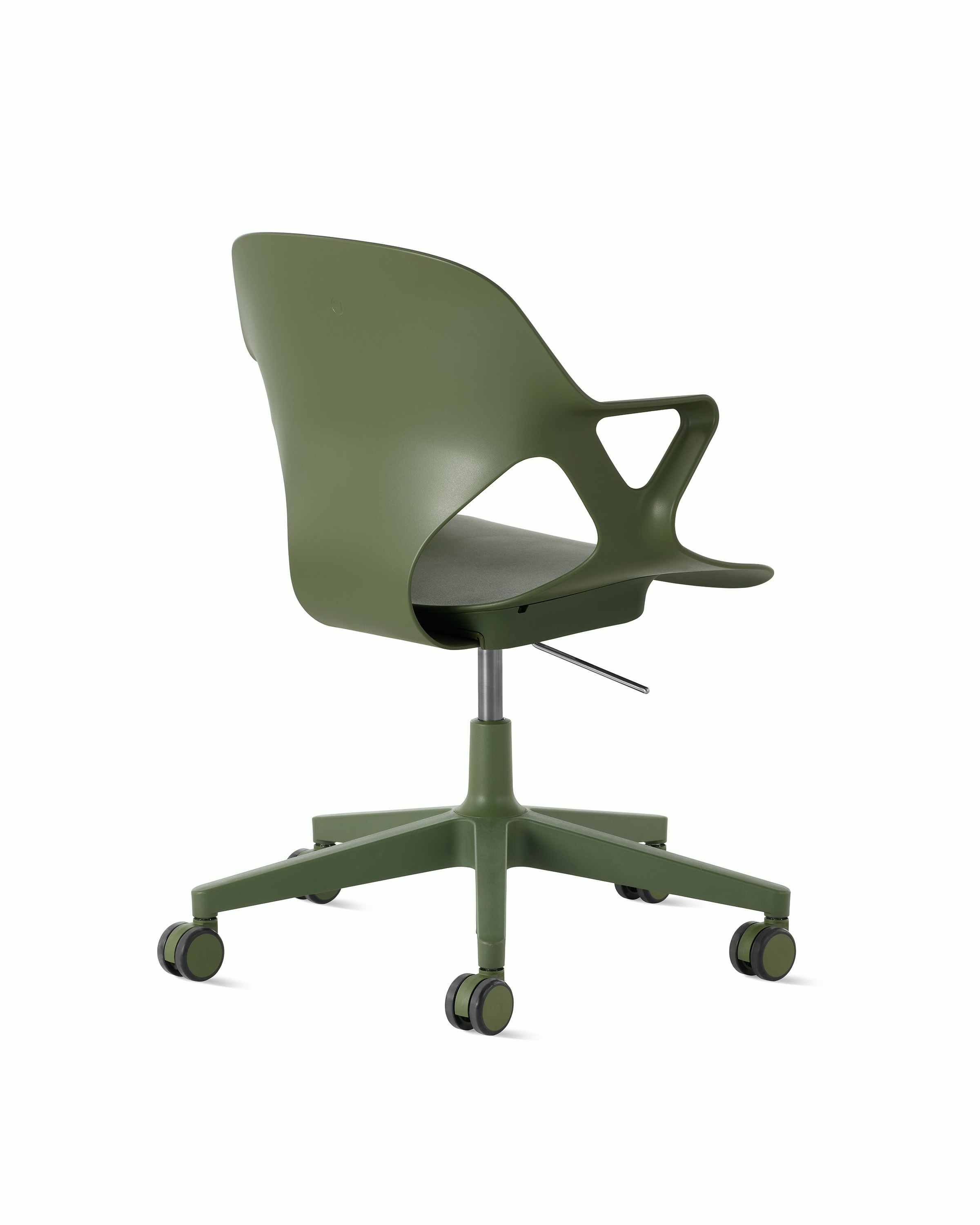 Rear angle view of a Zeph chair with fixed arms in olive.