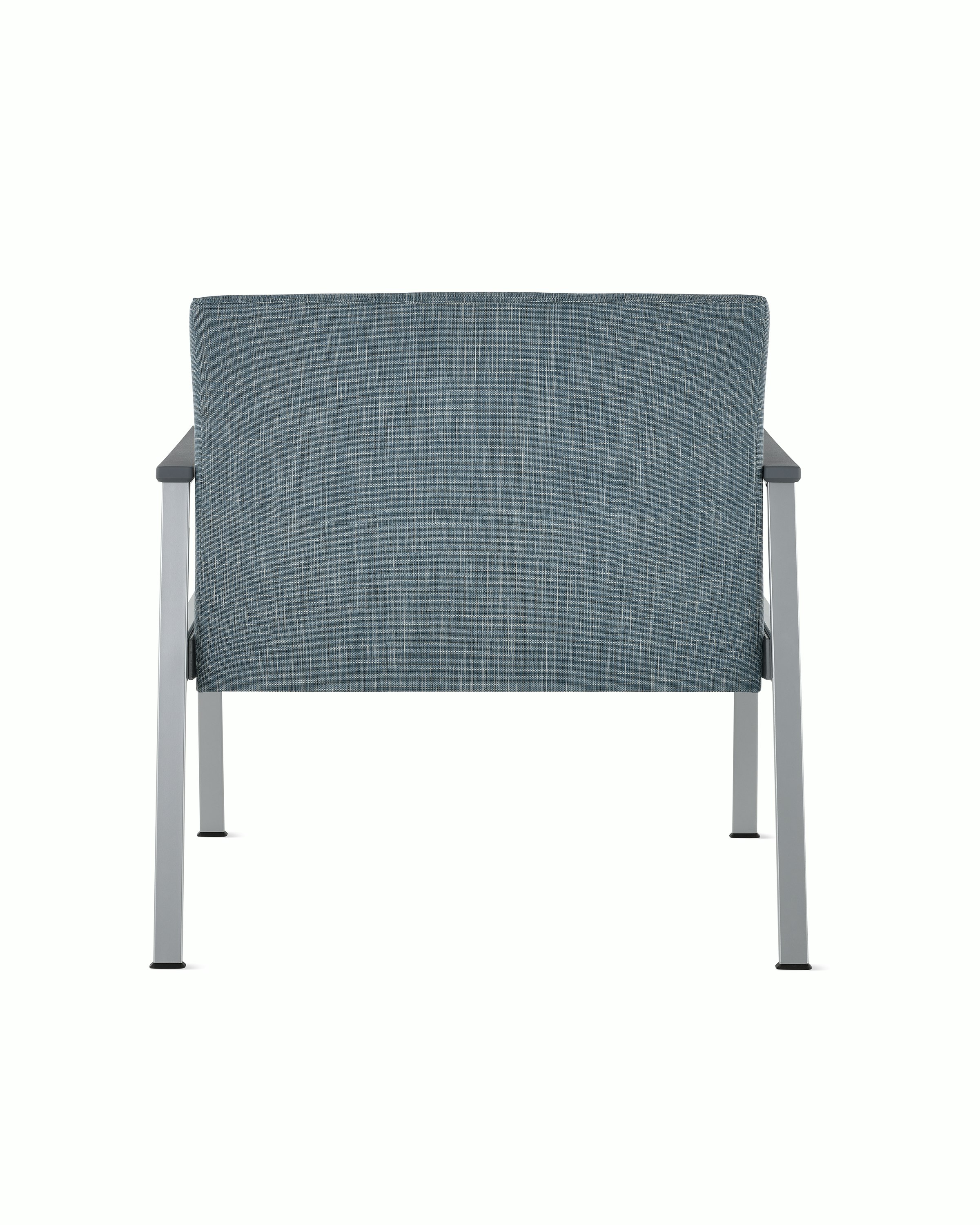 Rear view of an Easton Plus Chair with blue upholstery, metallic four leg base and slate grey arm caps.