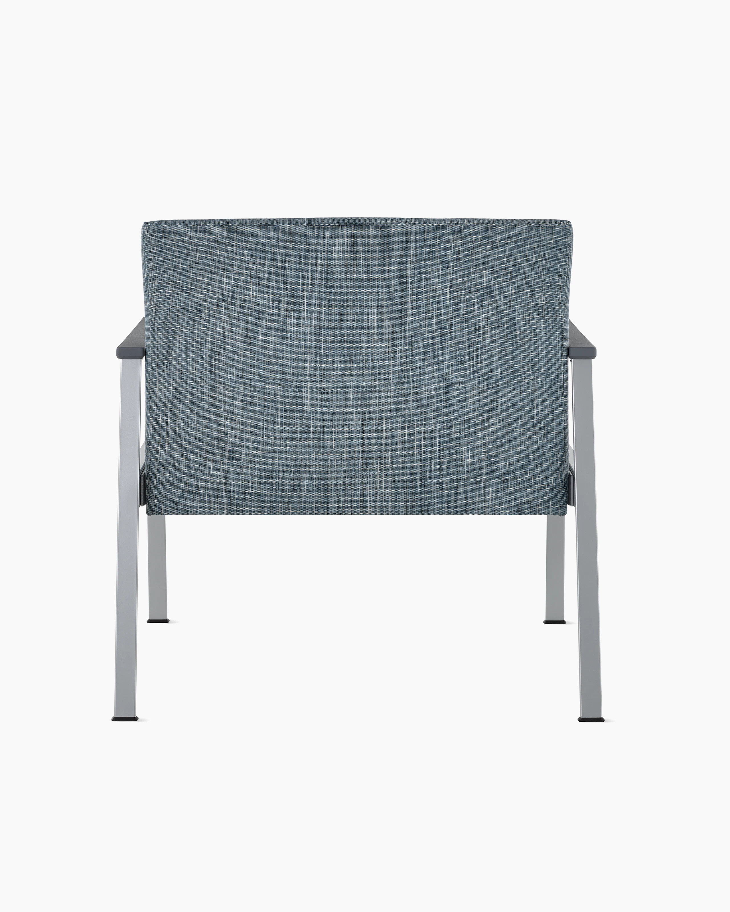 Rear view of an Easton Plus Chair with blue upholstery, metallic four leg base and slate grey arm caps.