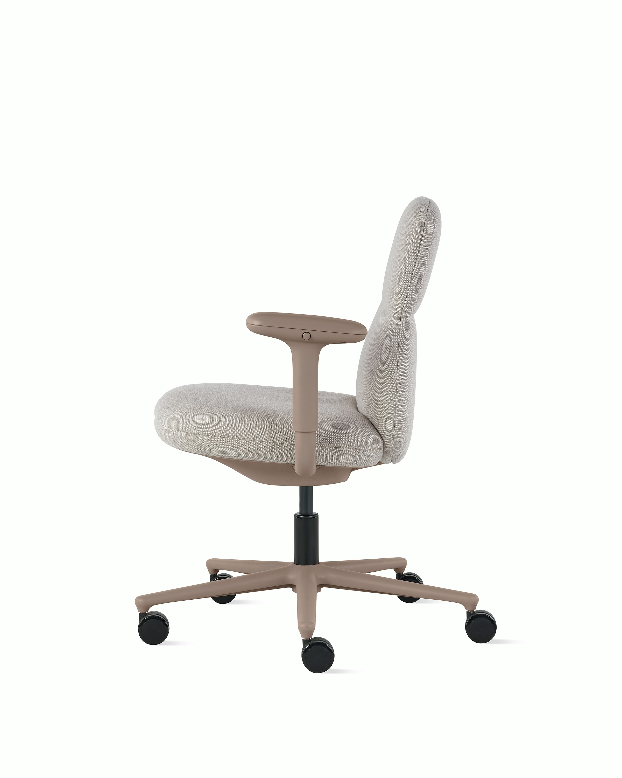 Side view of a mid-back Asari chair by Herman Miller in light brown with height adjustable arms.