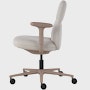 Side view of a mid-back Asari chair by Herman Miller in light brown with height adjustable arms.
