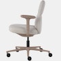 Side view of a mid-back Asari chair by Herman Miller in light brown with height adjustable arms.