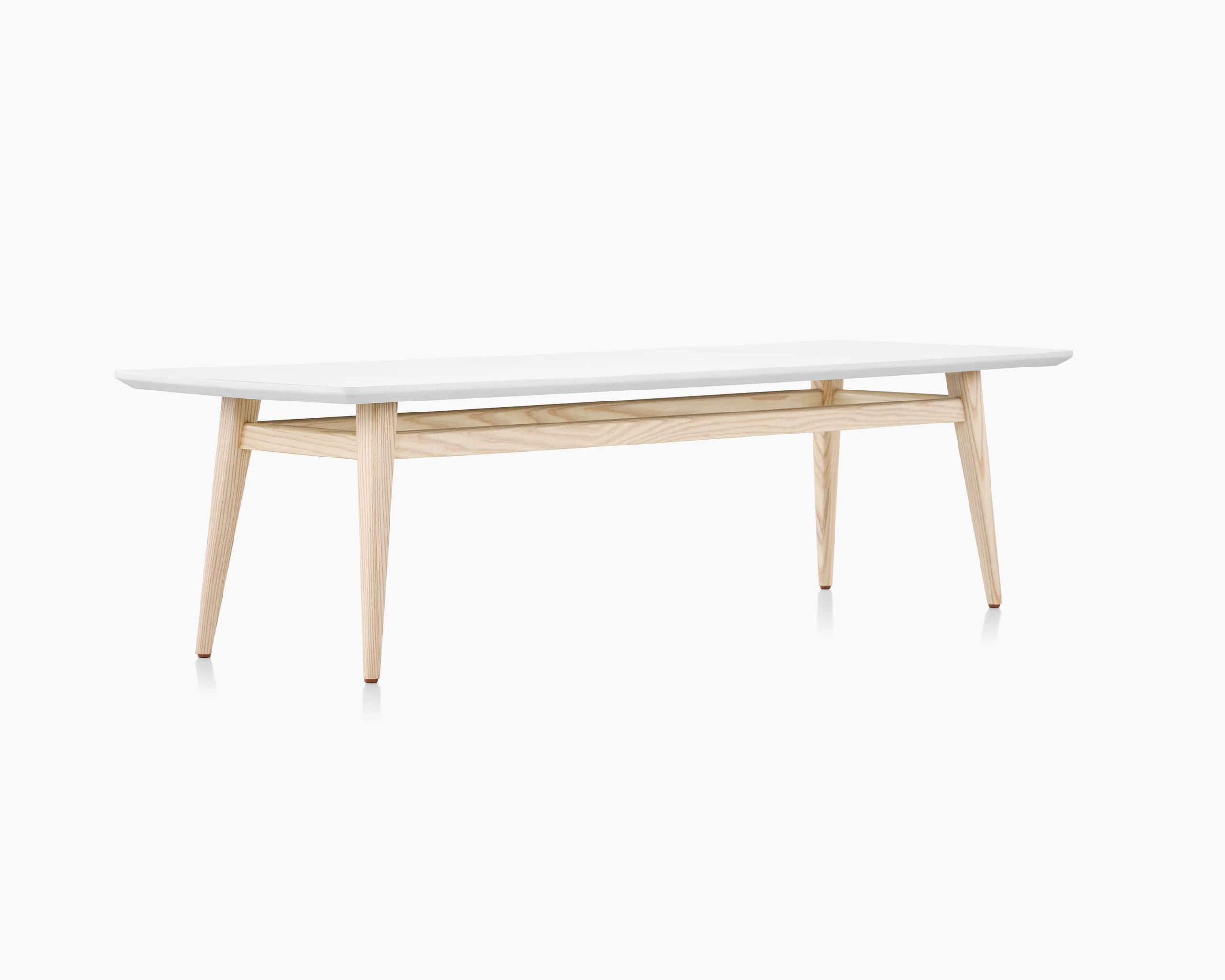 Palisade Occasional Table with wood legs and solid surface top on white sweep.