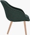 A soft green About a Lounge 82 Armchair with low back viewed from the side