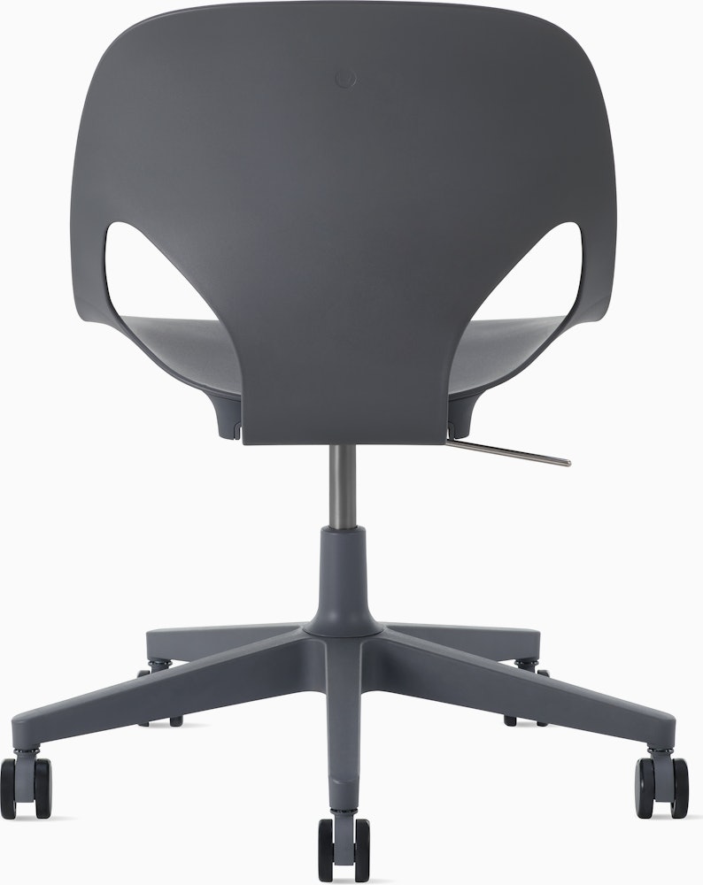 Rear view of a dark grey armless Zeph chair.