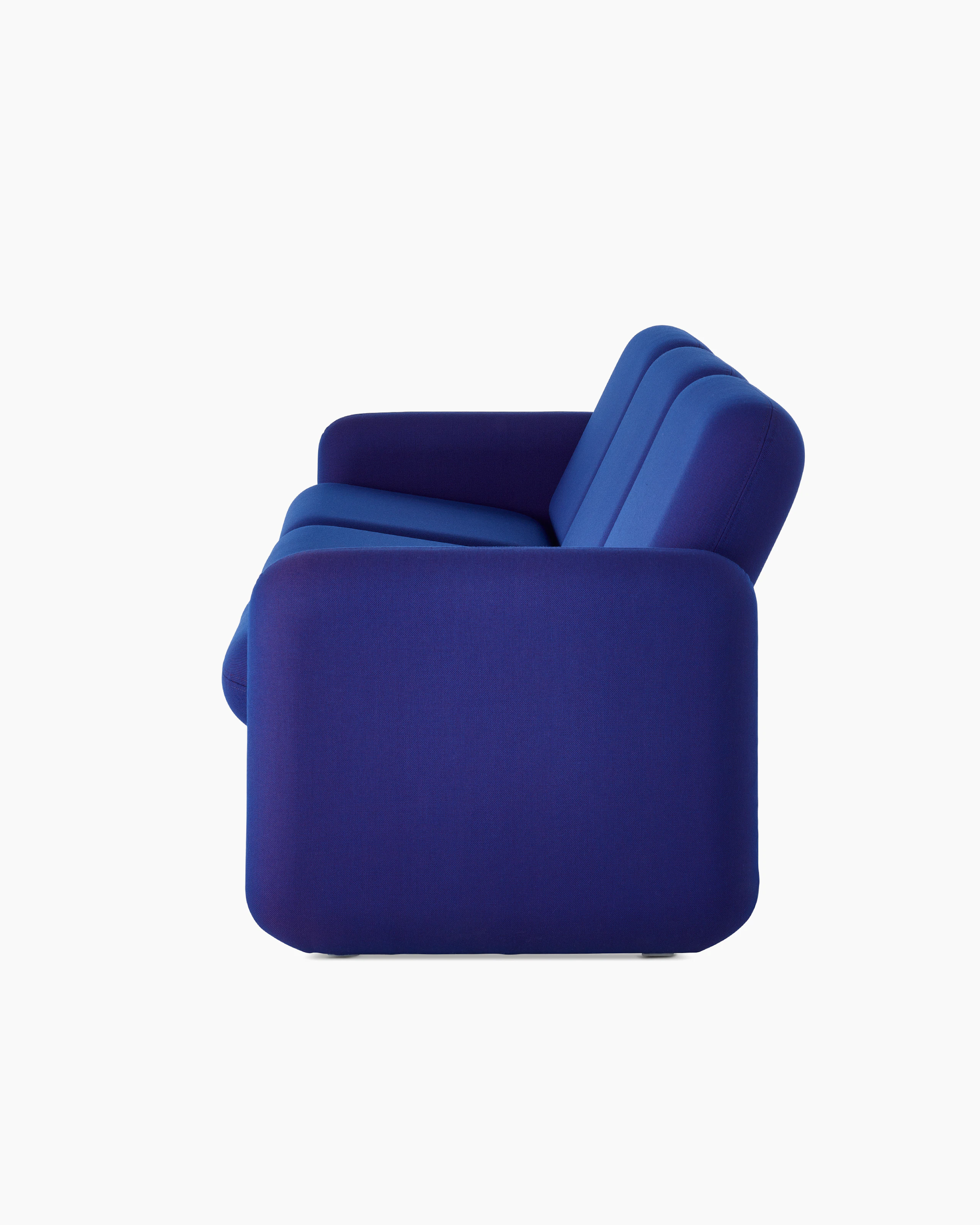 Profile view of a Wilkes Modular Sofa Group 3 Seat Sofa in blue.