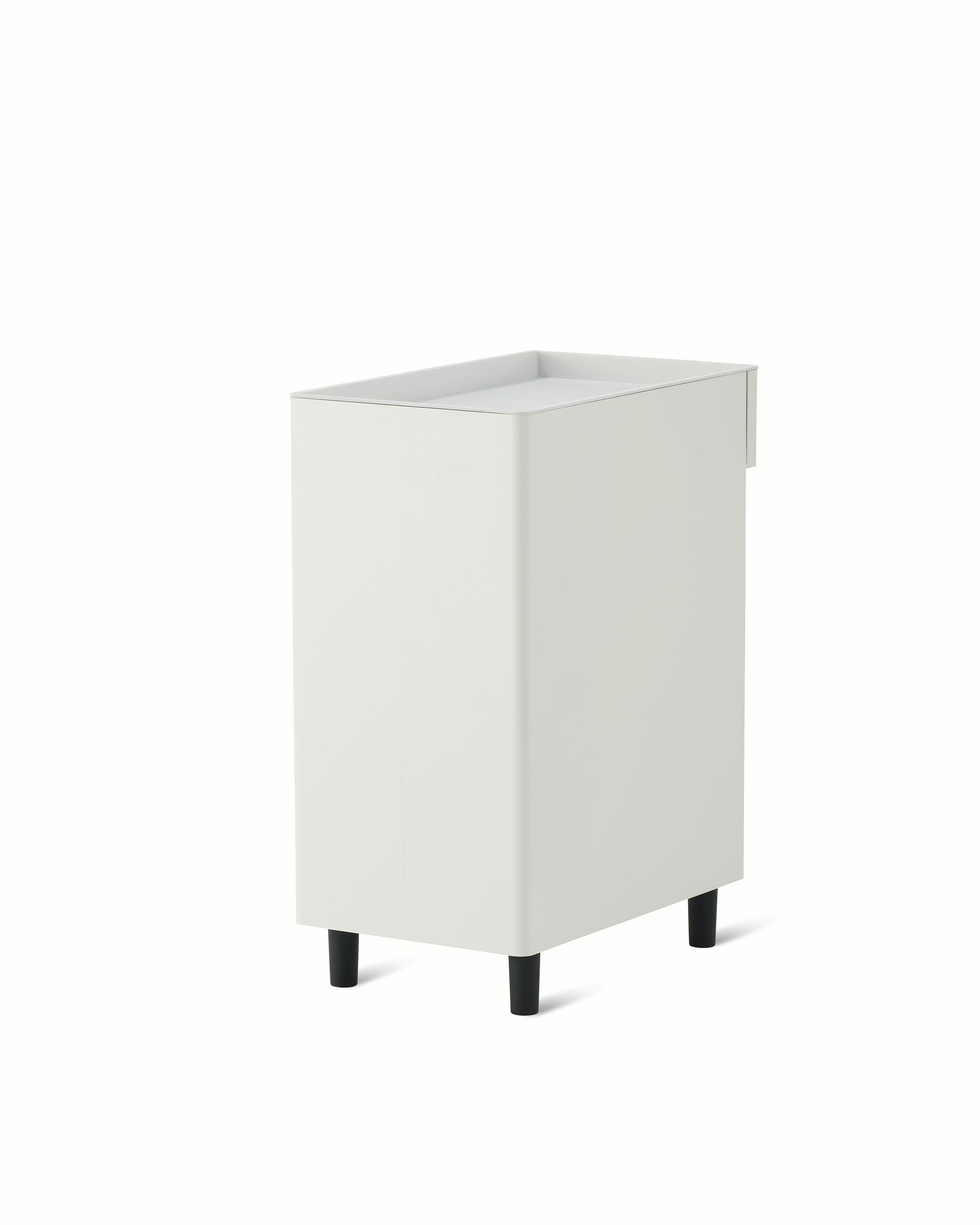 The back view of a slim, white storage pedestal on black feet.