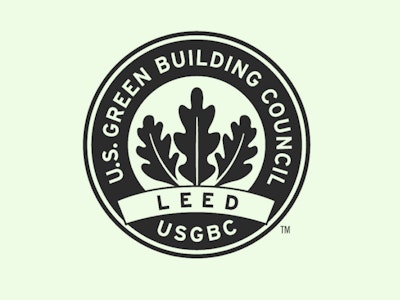 The LEED logo on a mint colored background.