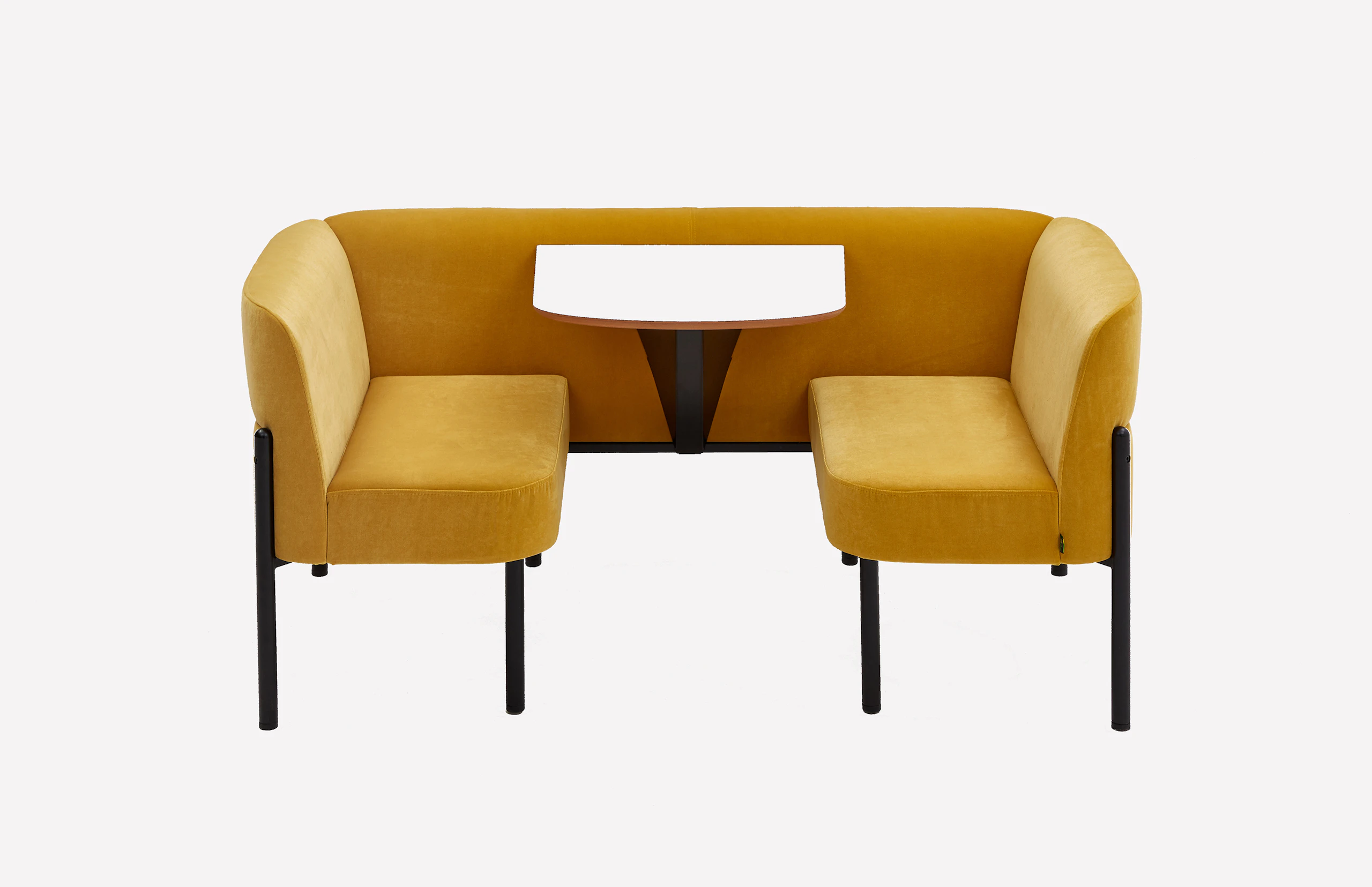 Front view of standard height Hue booth upholstered in yellow velvet, with black steel legs and integrated white mfmdf table top.