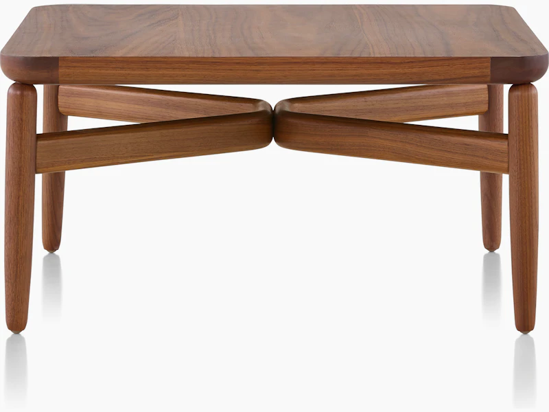 A rectangular Reframe occasional table with a medium wood finish, viewed from the front.