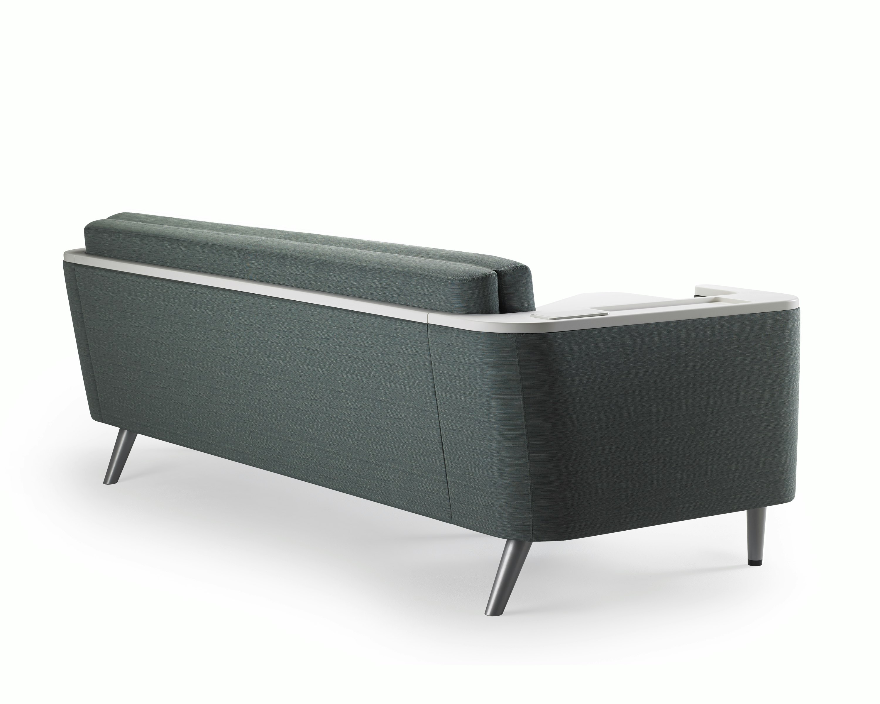 Detail of the back of Nemschoff Palisade Flop Sofa showing the solid surface arm and back cap.