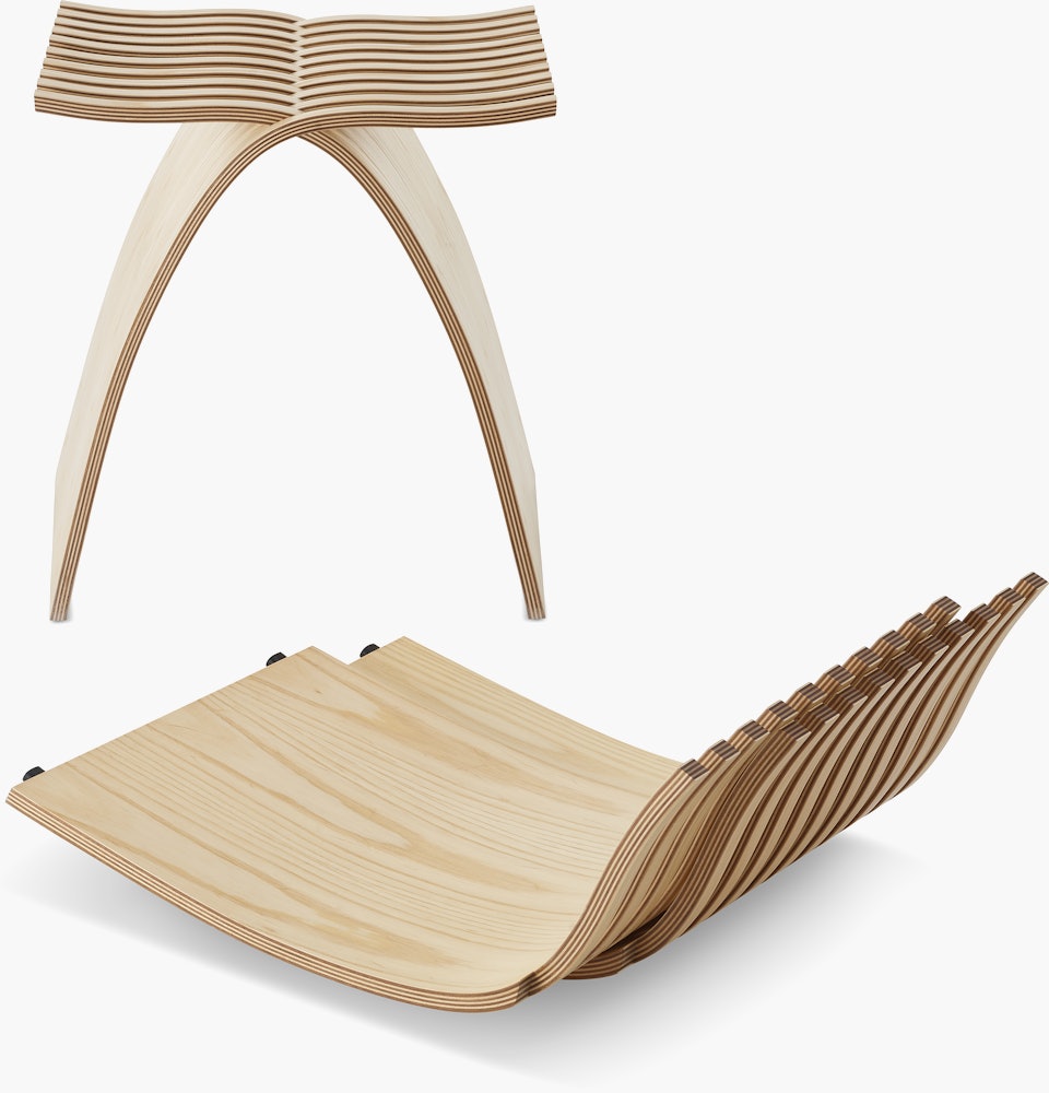 The two halves of a Capelli Stool are stacked in front of an assembled Capelli Stool.
