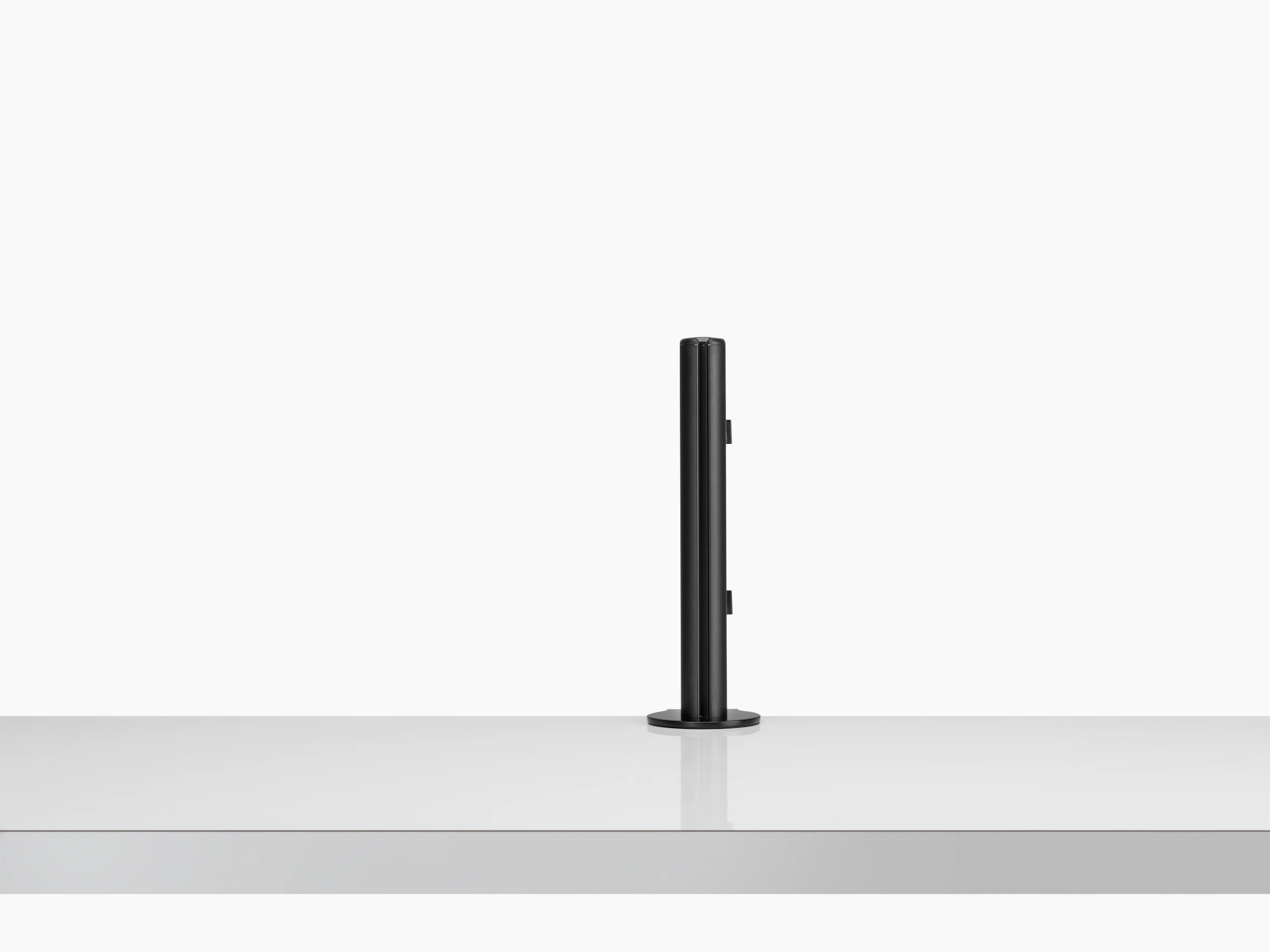 Front view of Lima Monitor Arm black post without arms or monitors.