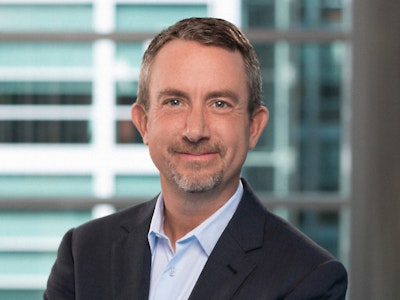 A headshot image of author Brian Elliott