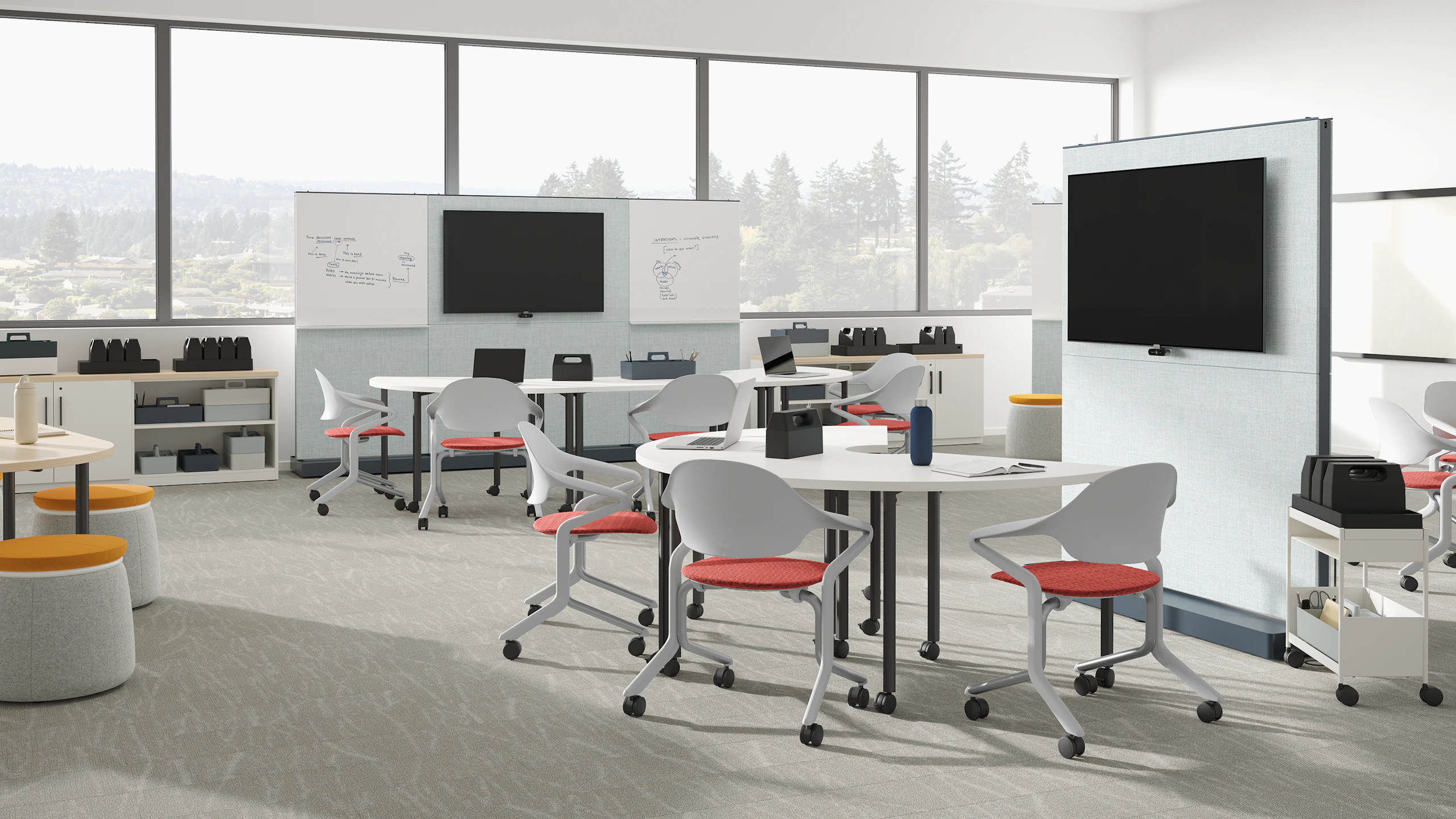Education classroom setting with mobile seating, project tables, batteries, walls and storage trolleys.