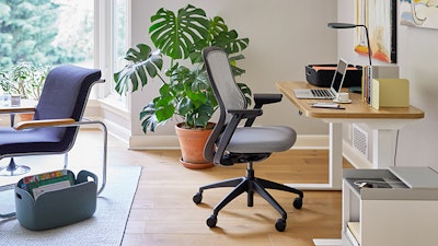 A Hipso Height-Adjustable Desk with a ReGeneration Chair in a home office.