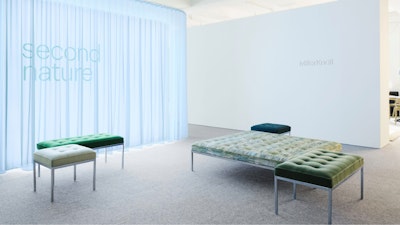 Several upholstered benches in front of the Second Nature exhibit at the MillerKnoll NYC Flagship store at 251 Park Avenue South in New York City