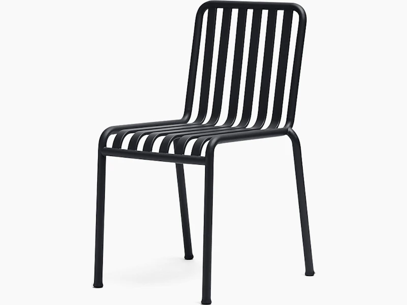 Three quarter view of a Palissade Chair without arms in dark grey.