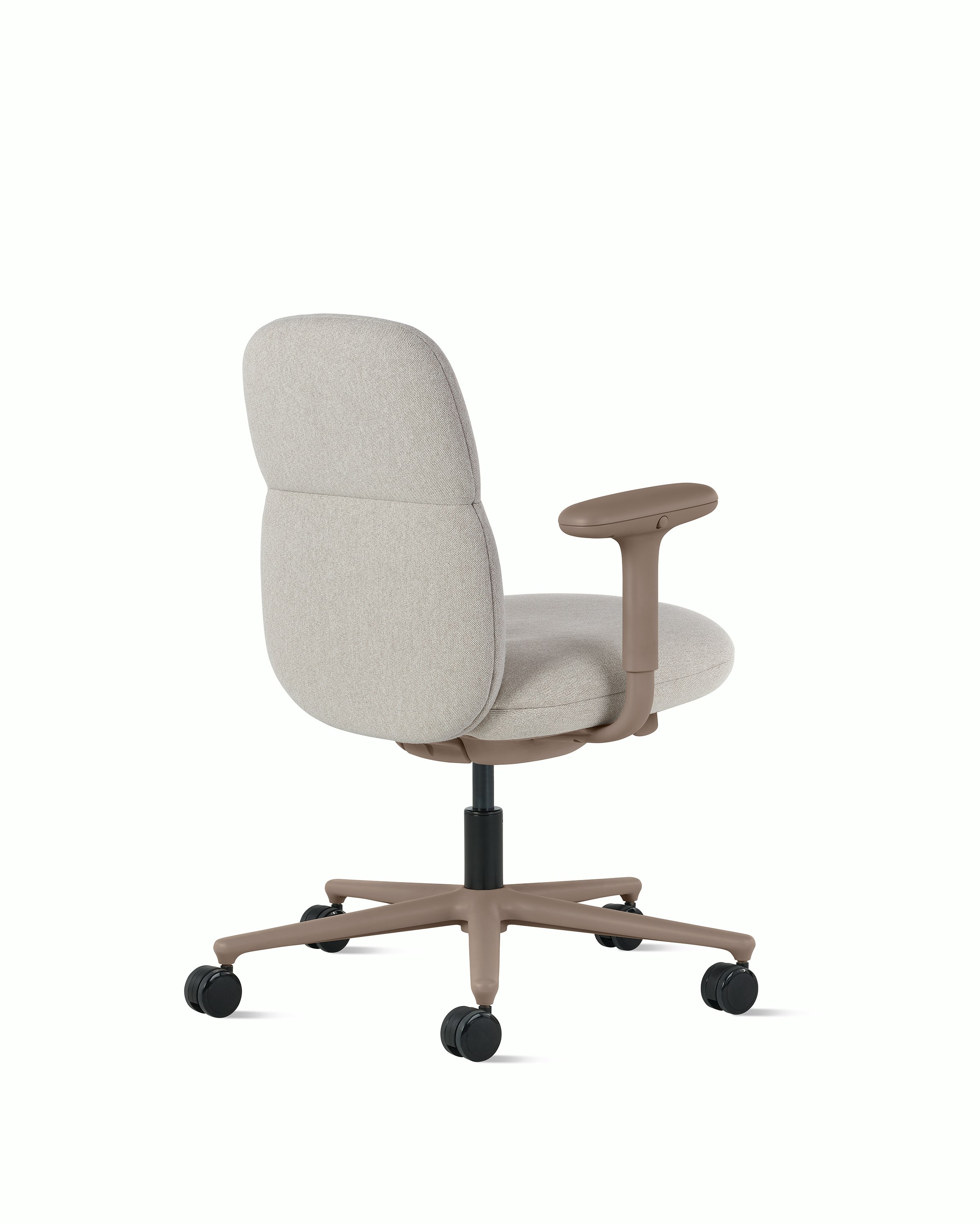 Rear  angle view of a mid-back Asari chair by Herman Miller in light brown with height adjustable arms.