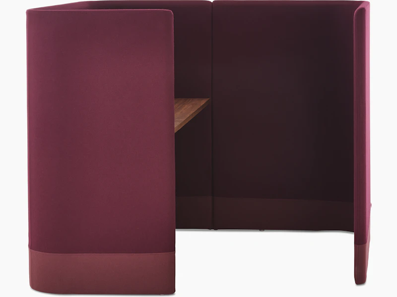 Whitesweep shot of Pullman Desk Pod upholstered in burgundy fabric with an oak desk top.