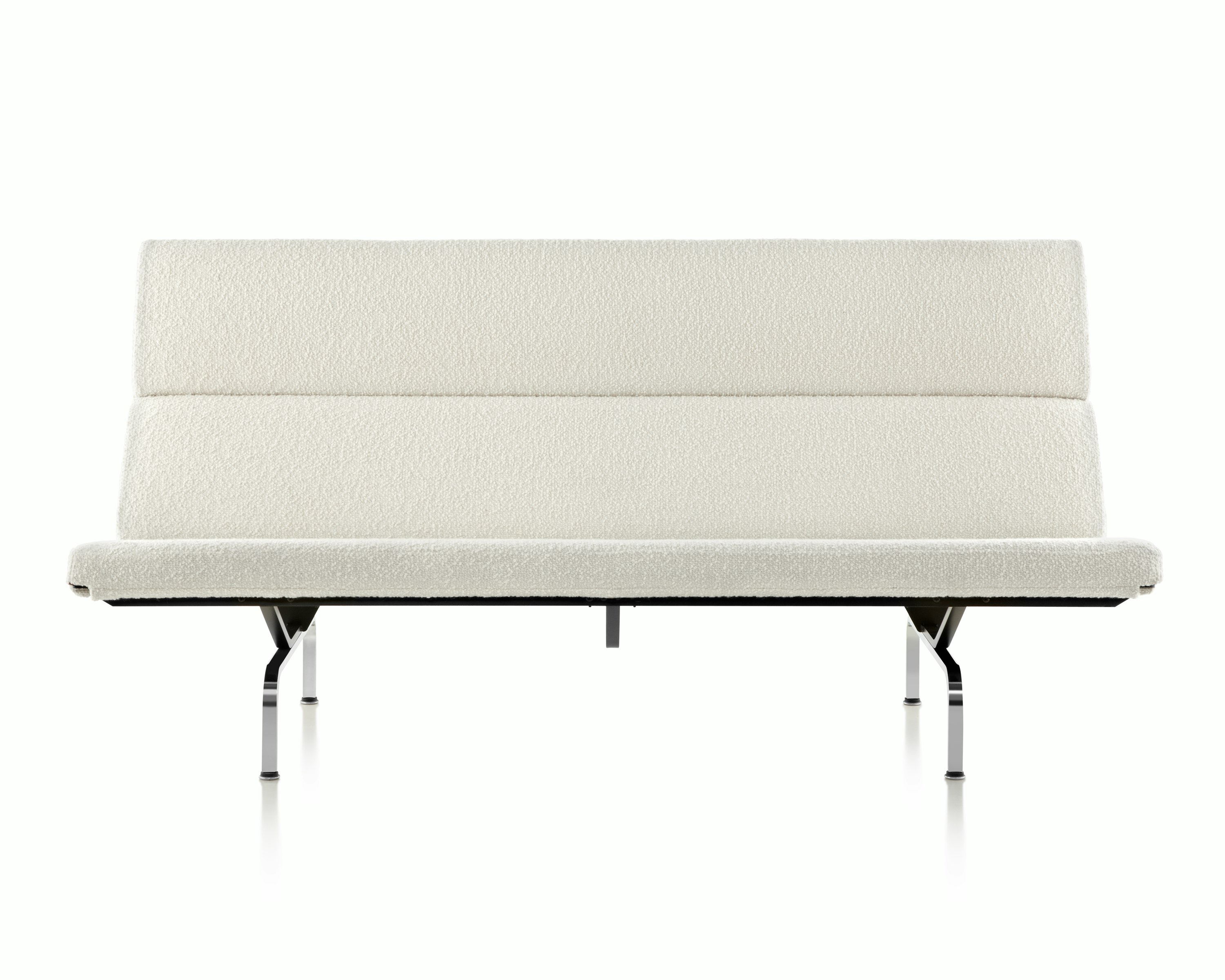 A Eames Sofa Compact upholstered in mt. stuart dove textile.