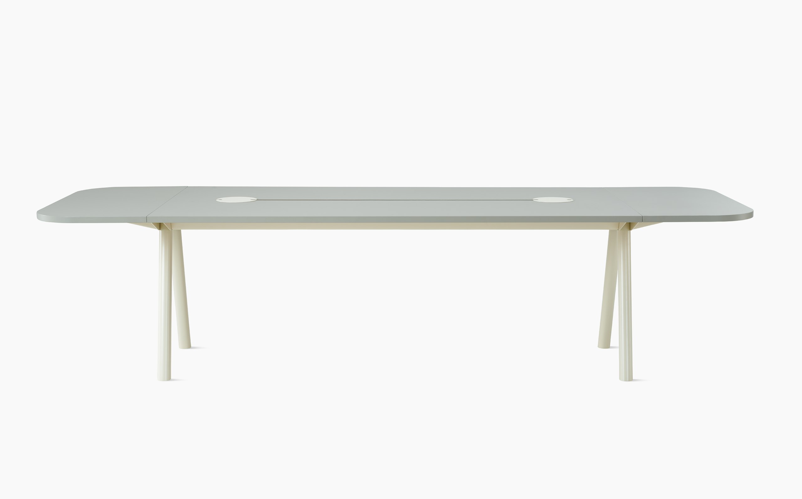 1000x3000 Morse table with Mushroom forbo top and oyster metal legs, with two power cut outs and radius ends.