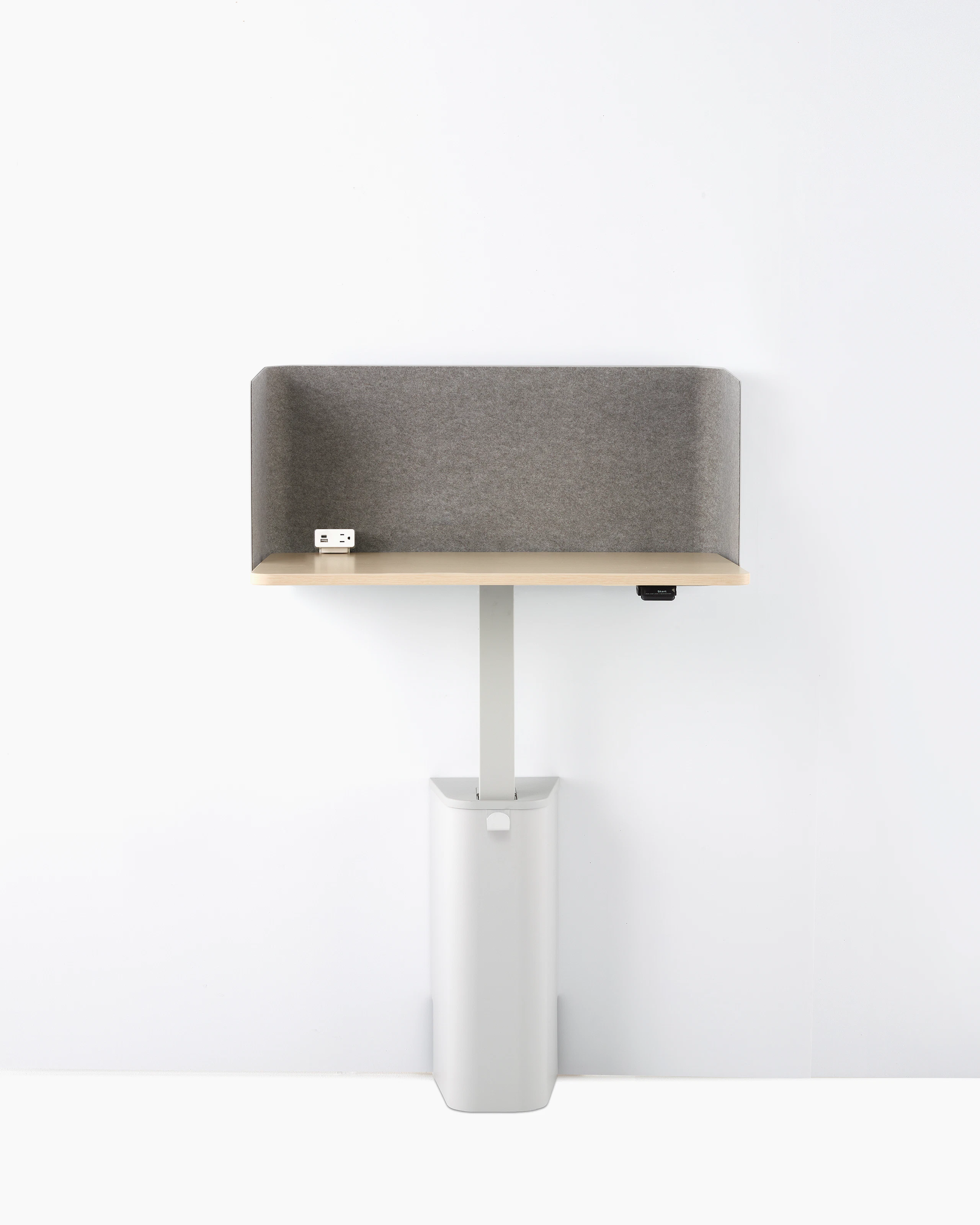 A grey single OE1 Micro Pack with light brown surface, viewed from the front.