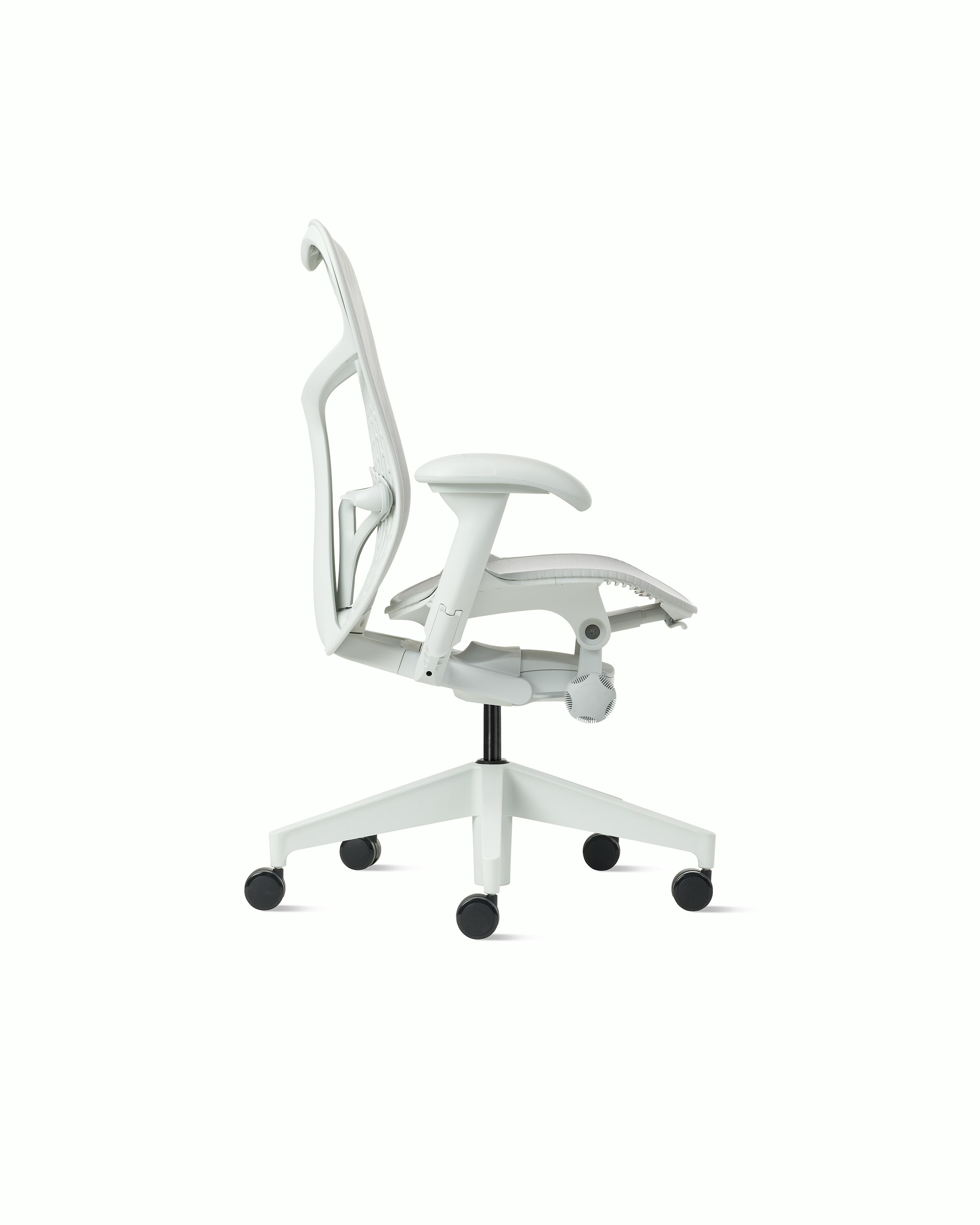 Side view of a Mirra 2 chair with a Butterfly back in alpine and a silver alloy base.