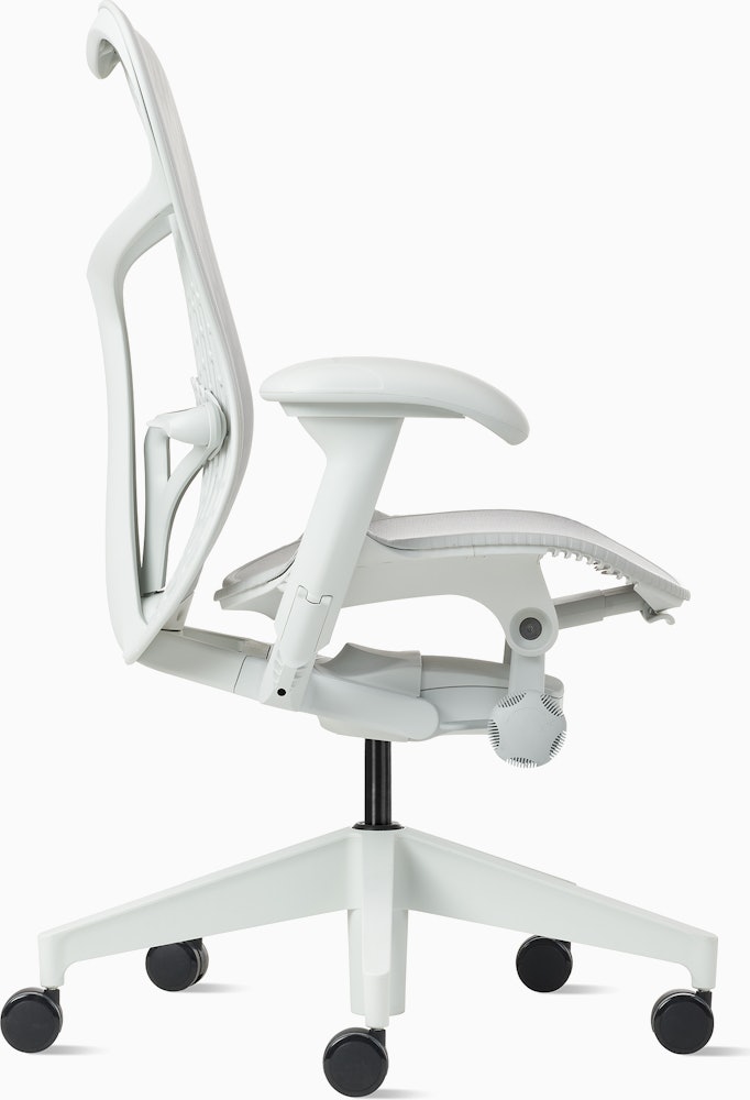 Side view of a Mirra 2 chair with a Butterfly back in alpine and a silver alloy base.