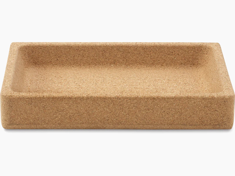 A small tray made of cork material.