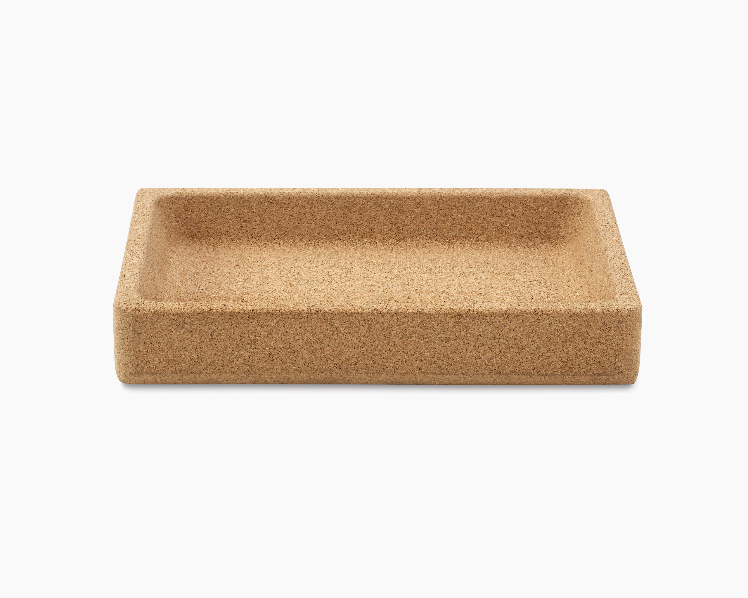 A small tray made of cork material.